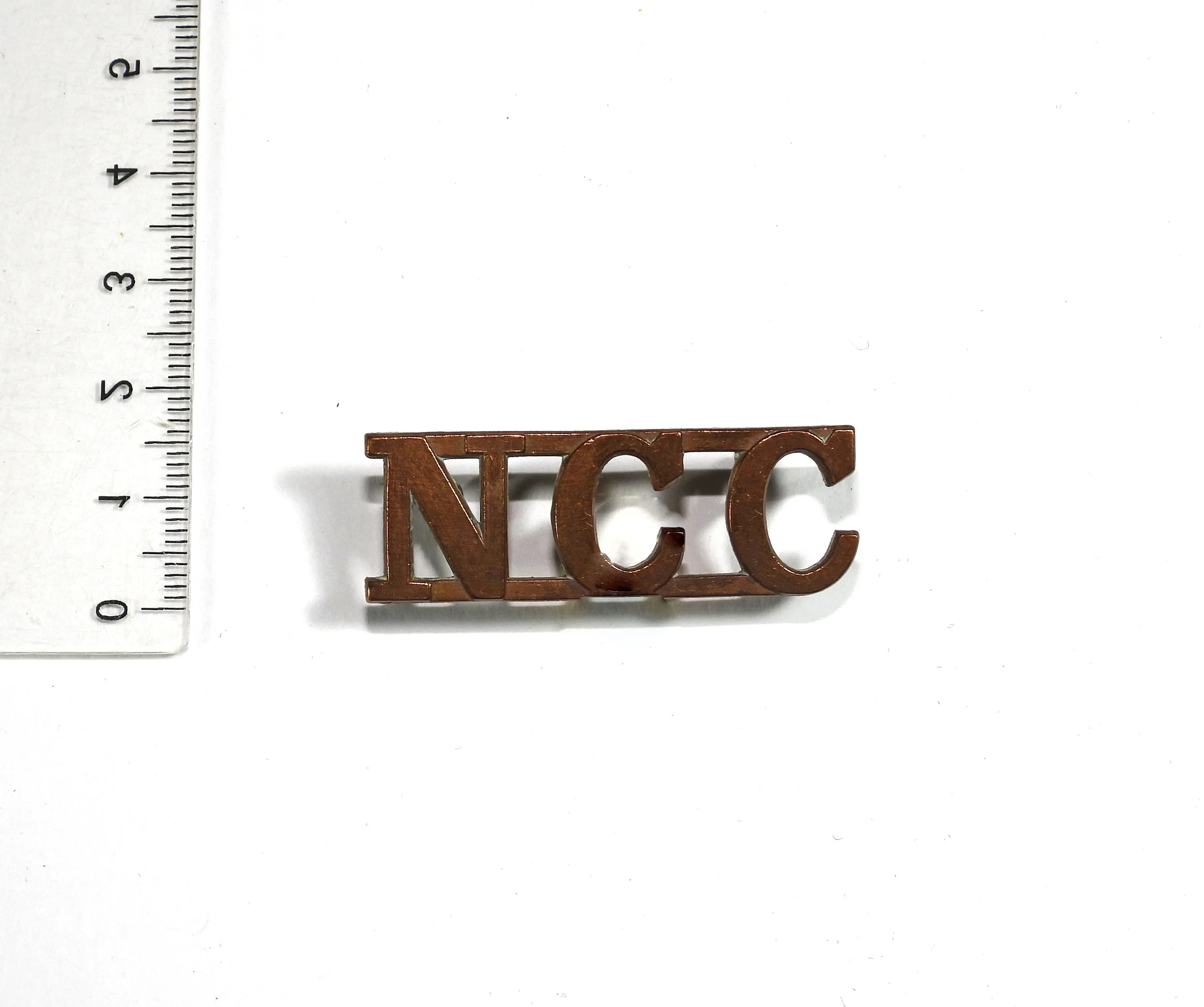 Non-Combatant Corps Shoulder Title. British Army, United Kingdom.