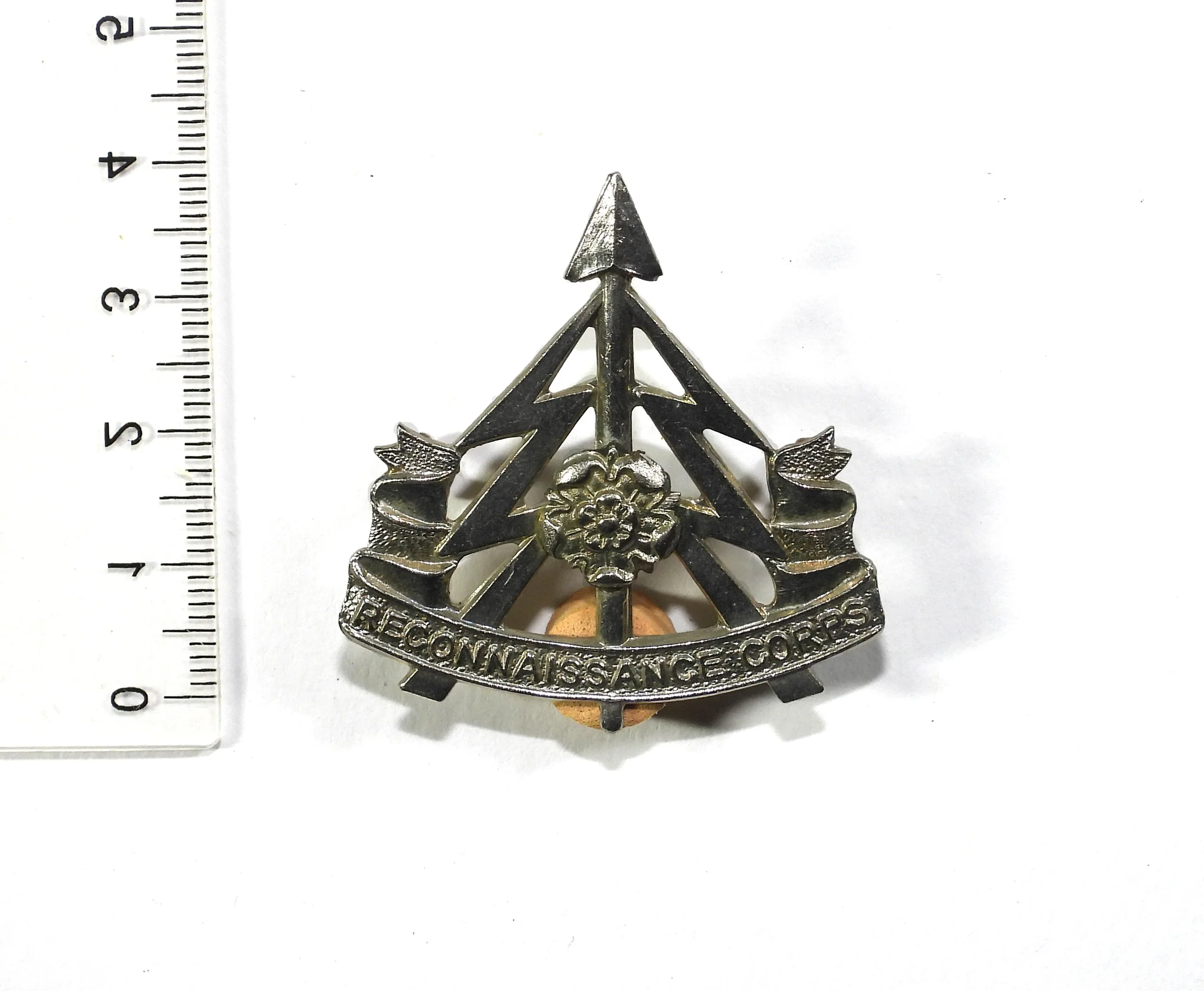 Reconnaissance Corps white metal Cap Badge. British Army, United Kingdom.