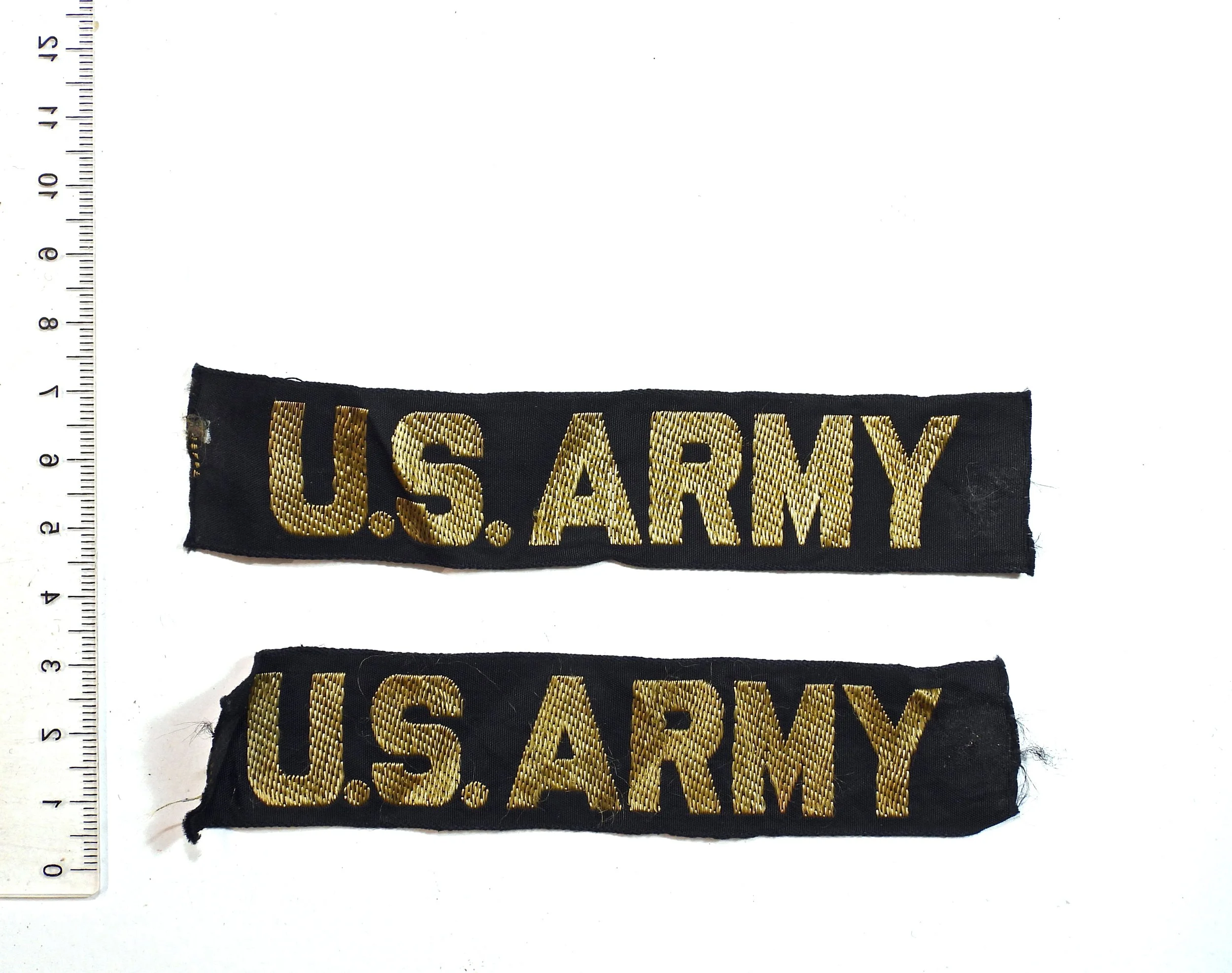 United States Army "U.S. ARMY" Colour Branch Tape Insignia. Two (2) items.