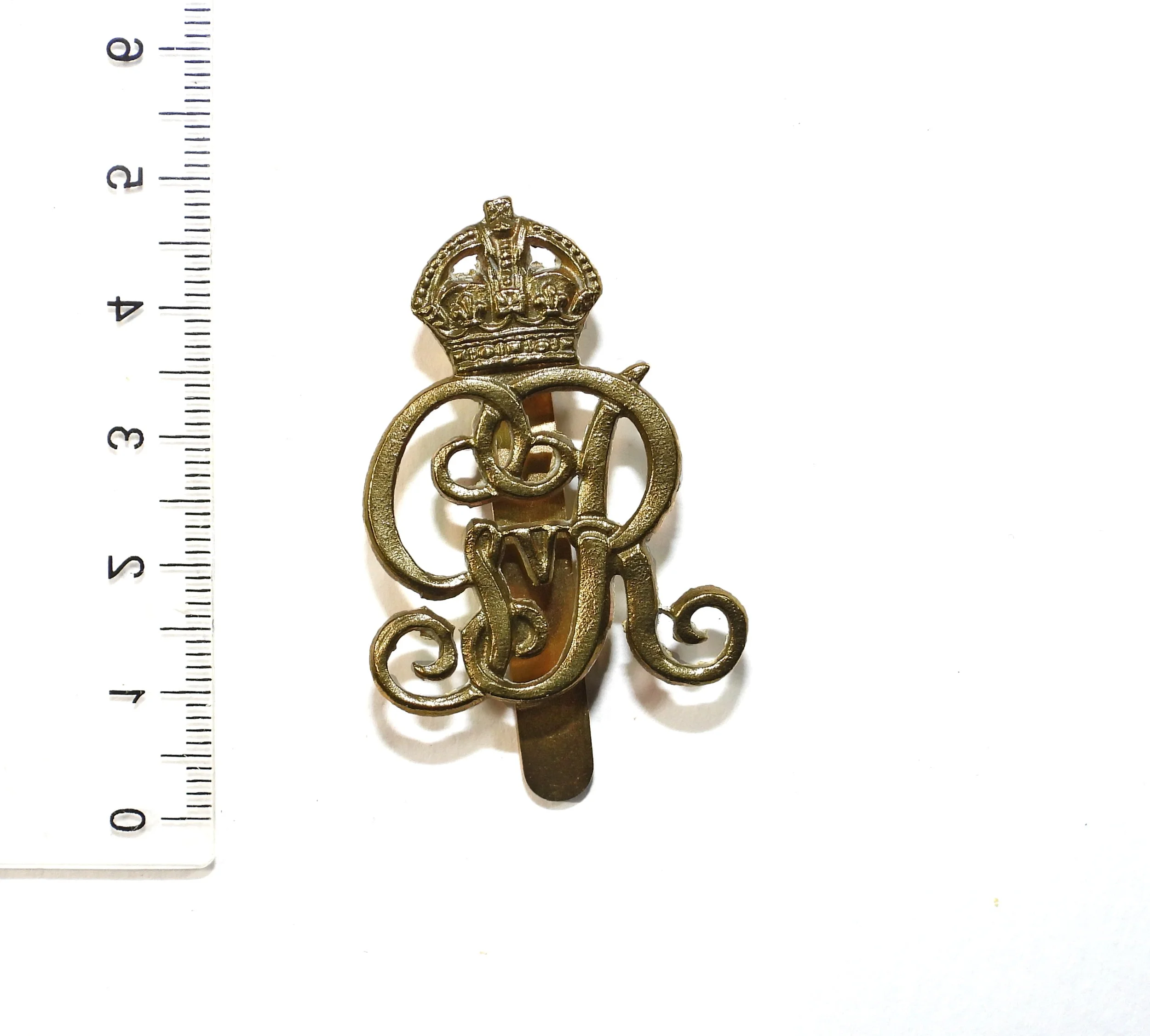 Military Provost Staff Corps GvR Cap Badge. United Kingdom.
