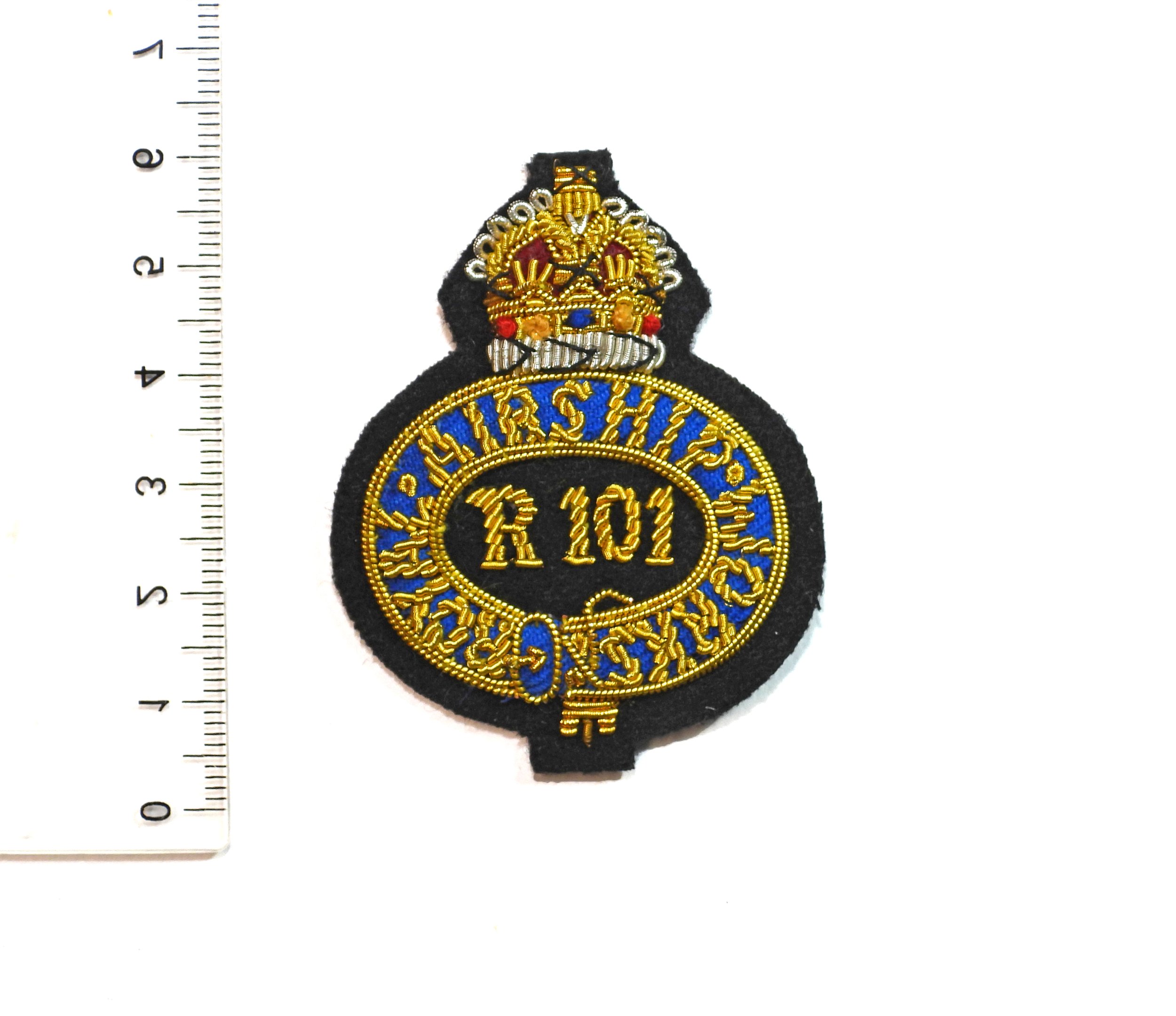 Royal Airship Works R101 Reproduction Cap Badge. United Kingdom.
