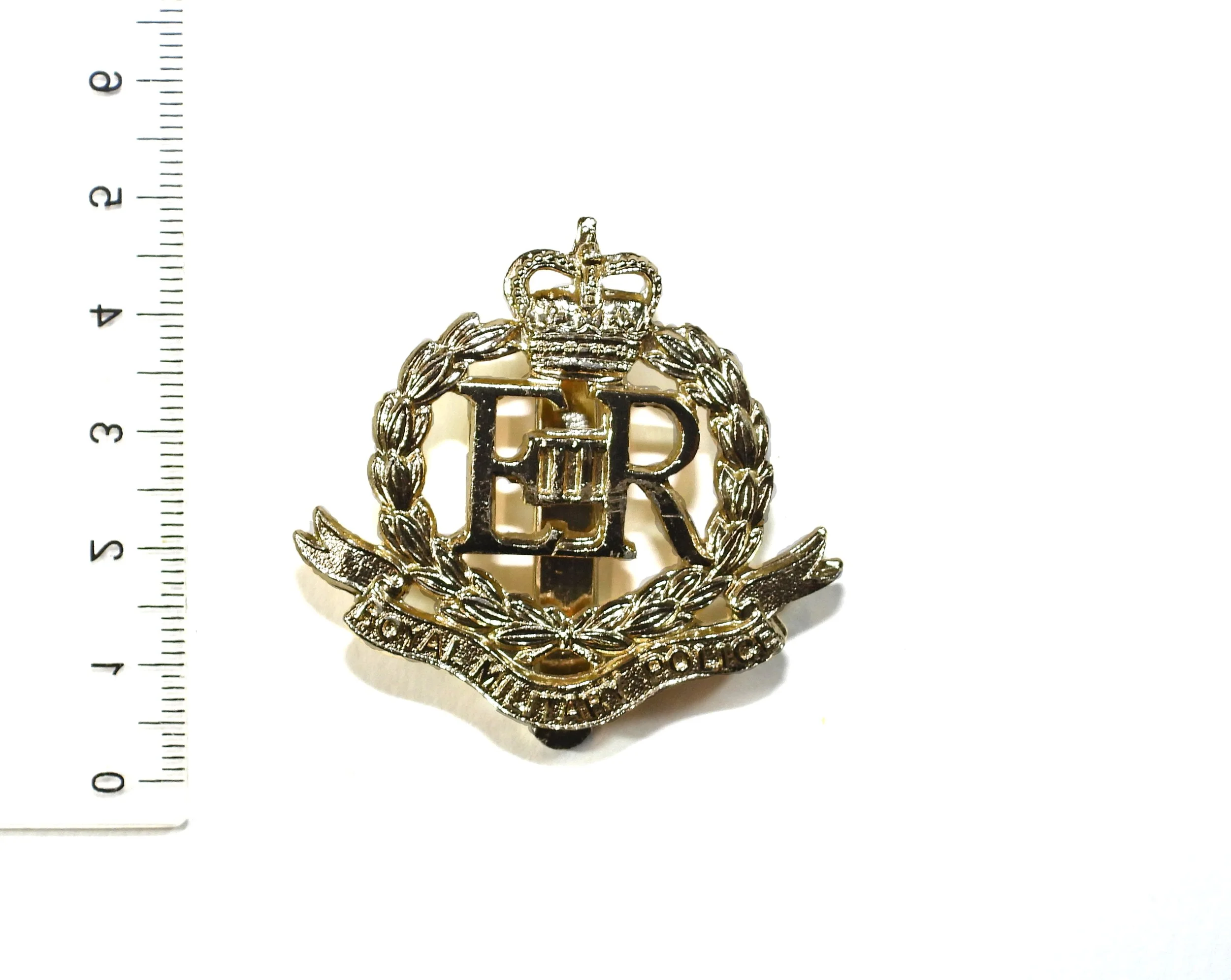 Royal Military Police Anodised Cap Badge. United Kingdom.