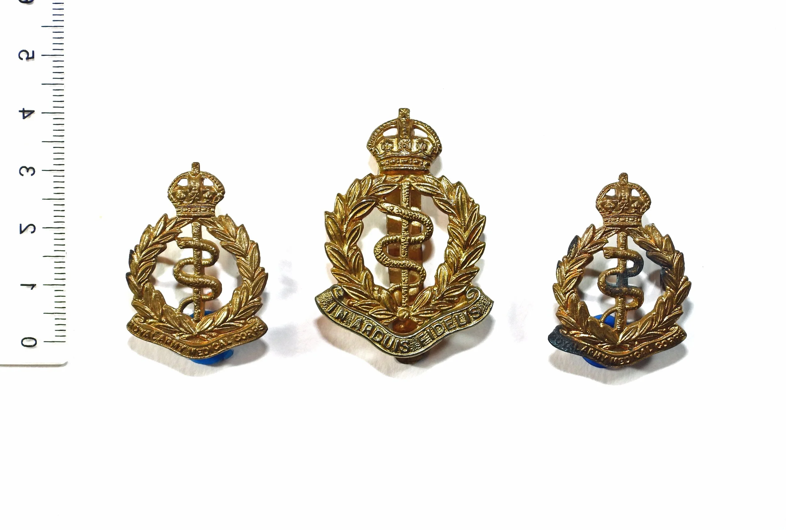 Royal Army Medical Corps Cap Badge and Collar Badges set (3). United Kingdom.