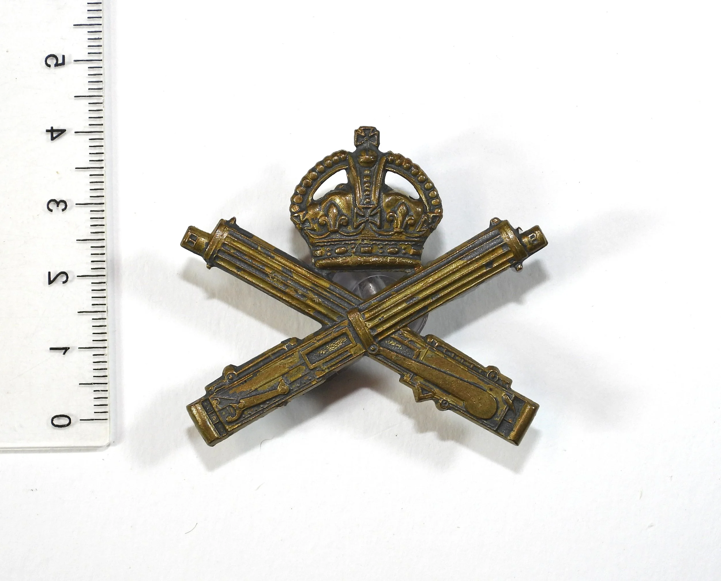 Machine Gun Corps Cap Badge. British Army, United Kingdom.