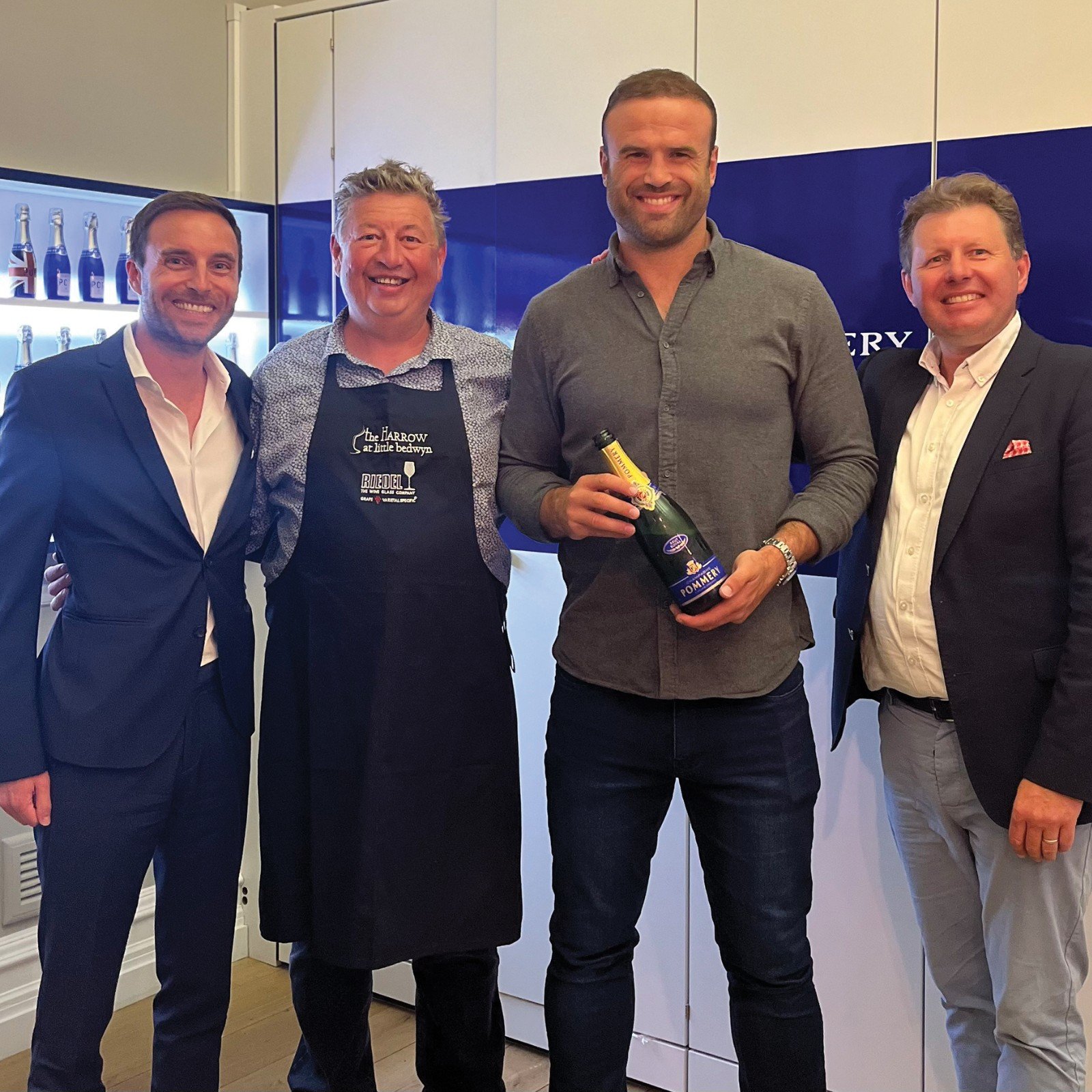 Jamie Roberts and Roger Jones with (left) Julien Looeux and Jamie Smith (right) of Pommery