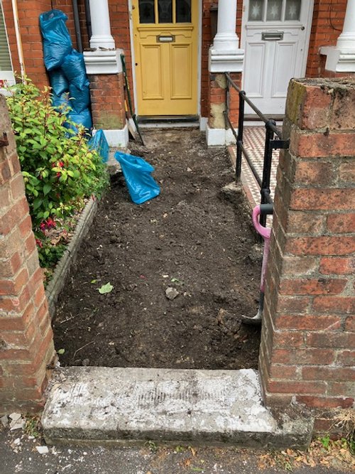 Path dug up in preparation for levelling
