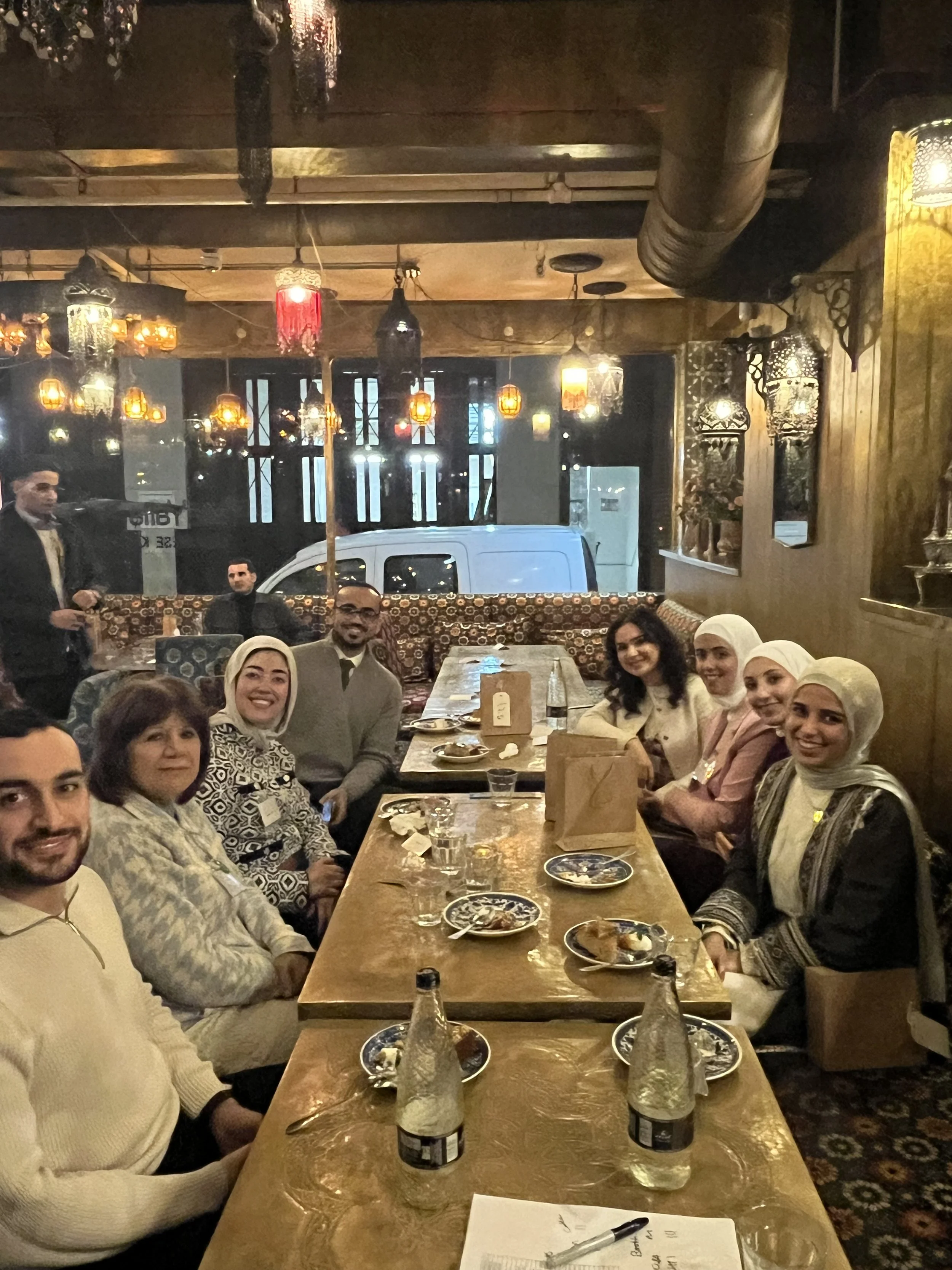 Photo of scholars and guests attending Iftar event