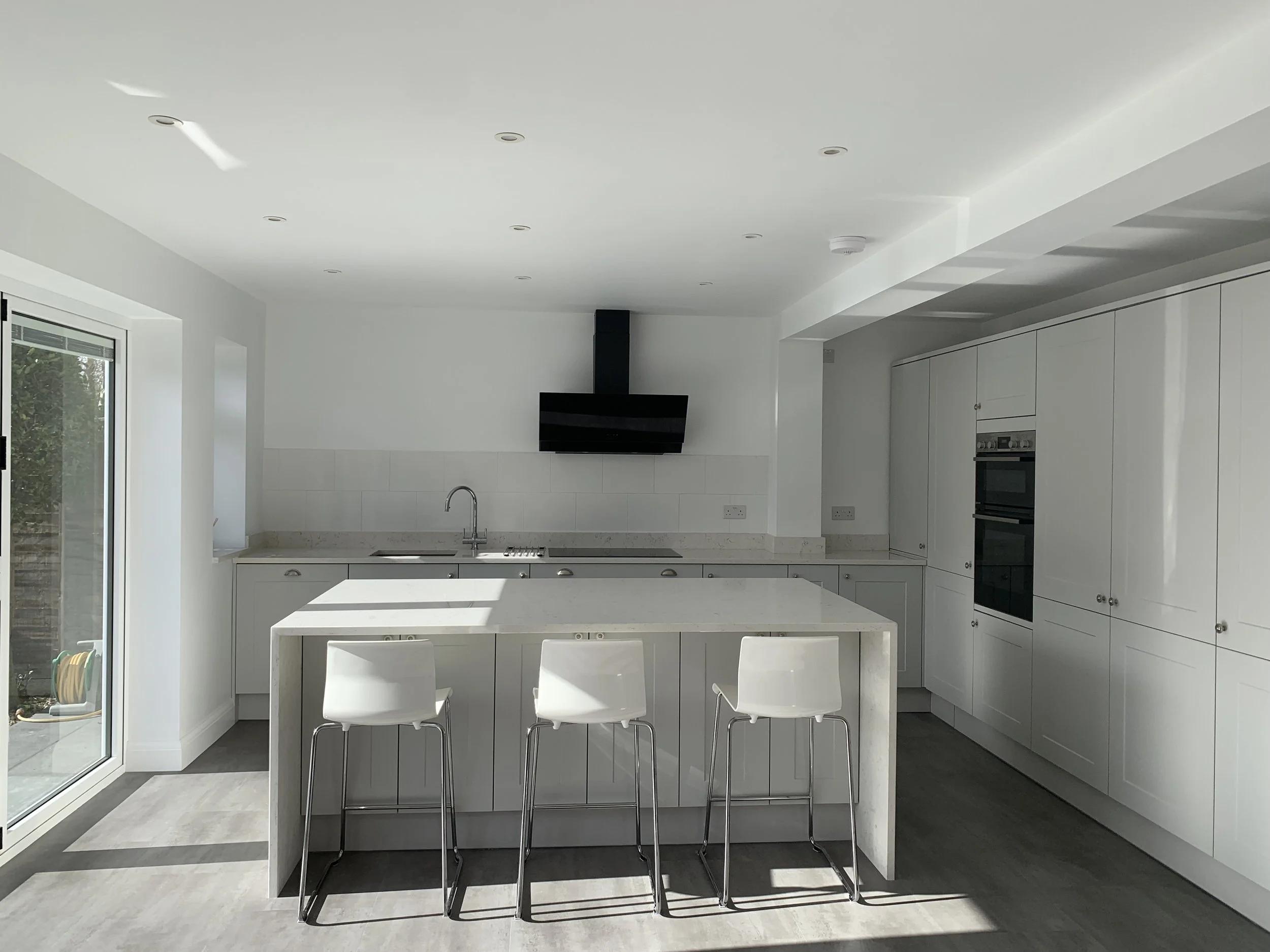 Contemporary twist on a shaker kitchen   