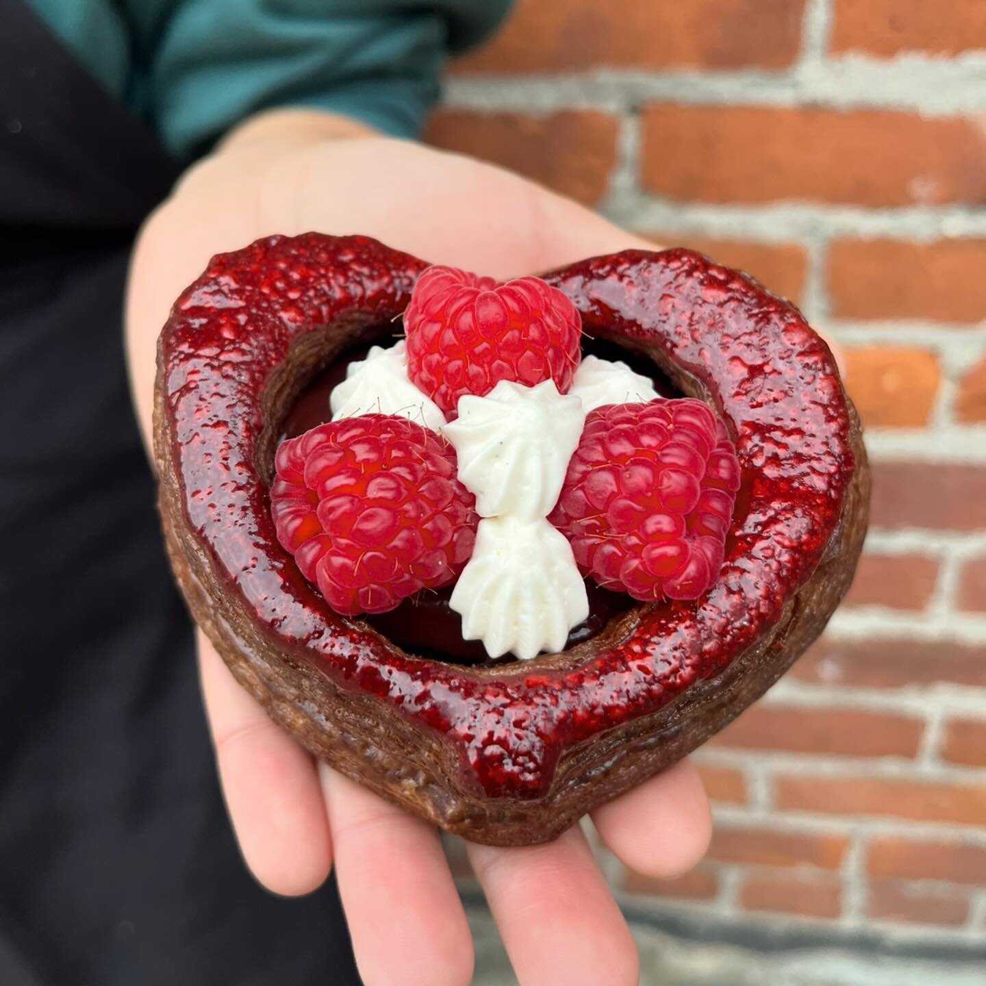 We had to make SOMETHING for Valentines Day!  This is  a chocolate raspberry heart ❤️ made with chocolate almond frangipane, raspberry chocolate pastry cream, fresh raspberries and vanilla whipped cream. Available today at @pkunderwearfactory and @th