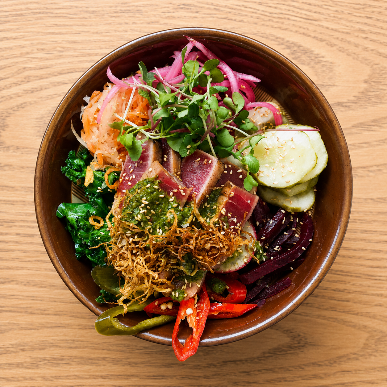 Black Tuna Bao-Less / Torched tuna, Chimichurri, crispy ginger, radish, micro greens, house pickles. Comes with your choices of fried rice, kale salad or both - 185,000 VND 