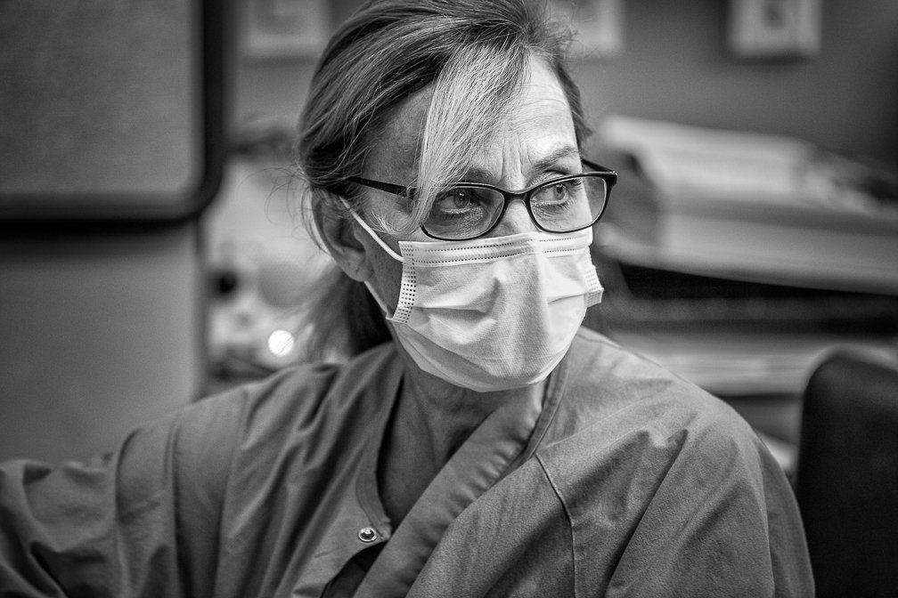 A nurse shows near the end of a long shift in the Covid ICU.