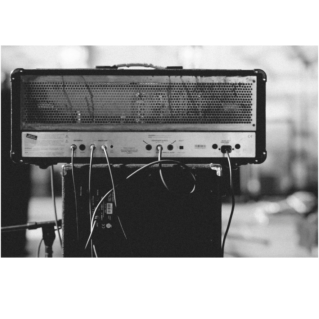 black and white image of an amplifier representing communication