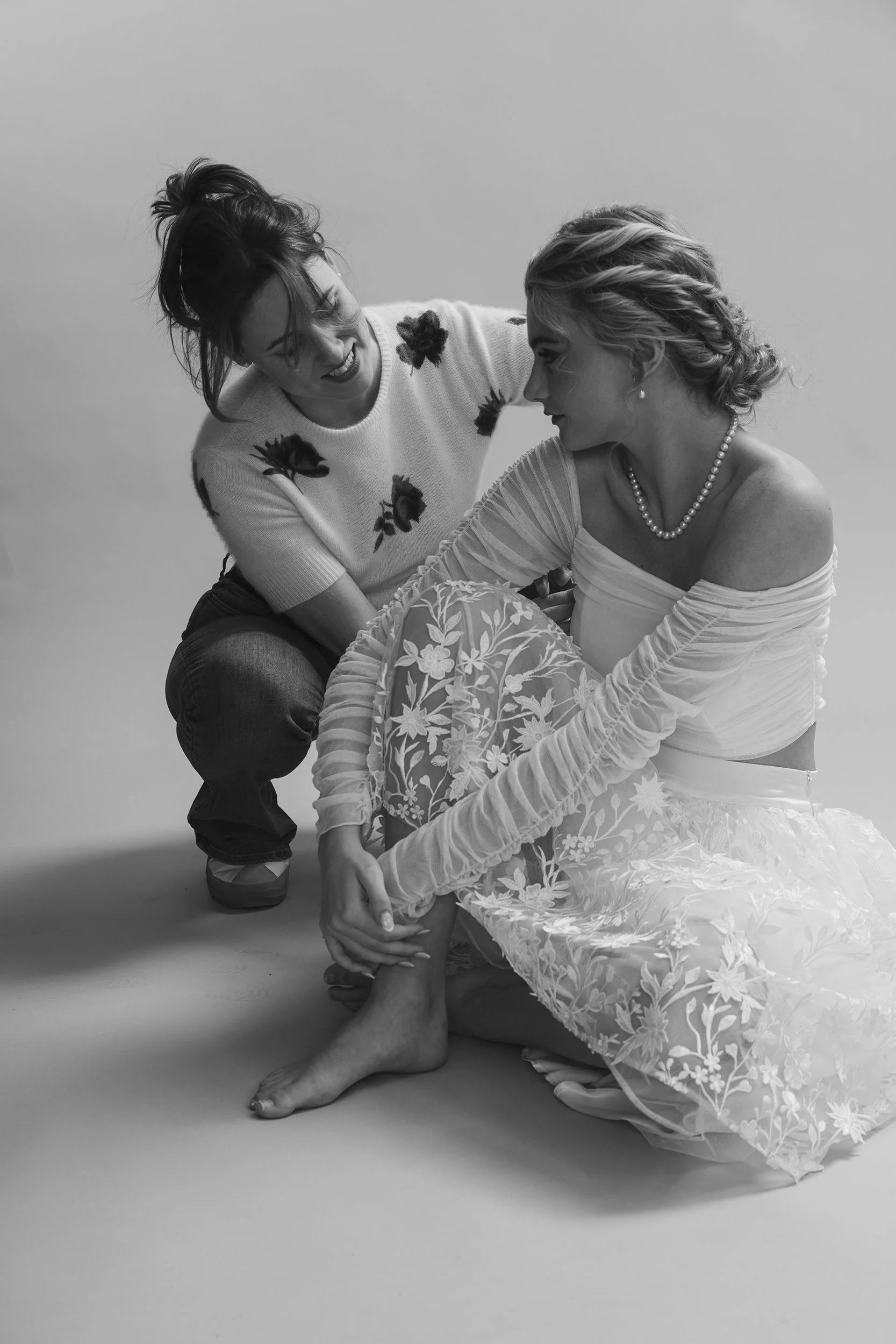 Custom couture wedding gown designer working with a bride wearing bridal separates.