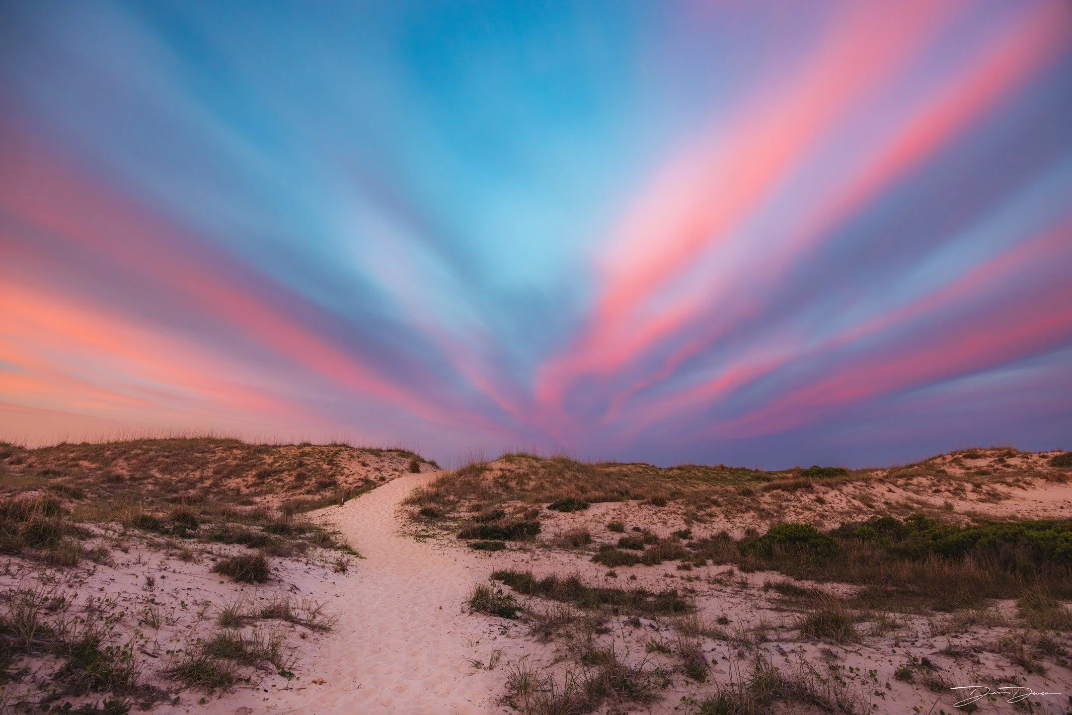 Vibrant sunset at a secluded beach in Virginia Beach, Va. 
.
.
Shot on a @canonusa R5 + 14-35mm F4L + @nisiopticsusa Nd filters

Settings:
16mm / 90" / ISO 250 / F 9.0
.
.
.
#virginiabeach #visitvirginiabeach #sunsetphotography #beachsunset #fin