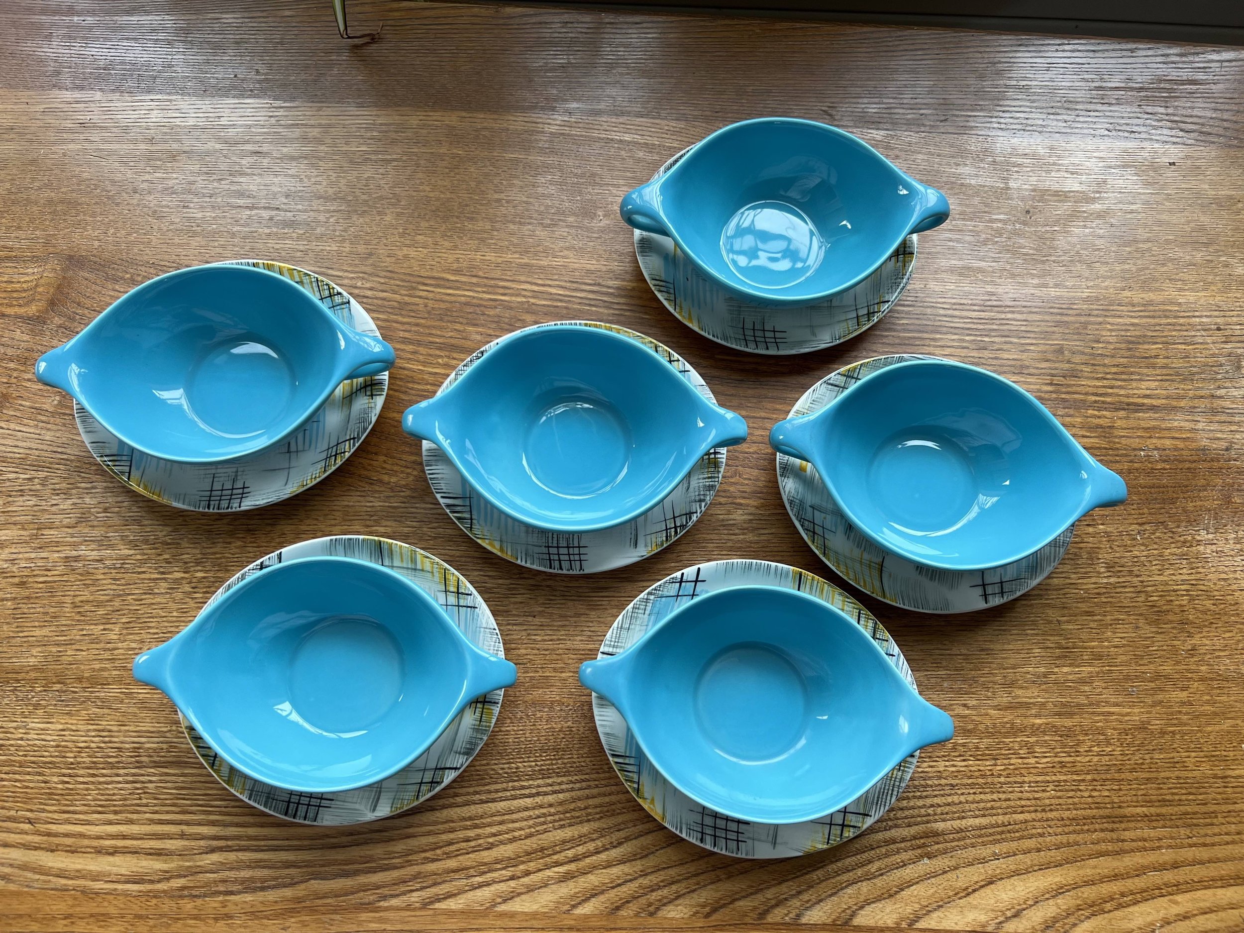 Overhead view of soup bowls on the plates