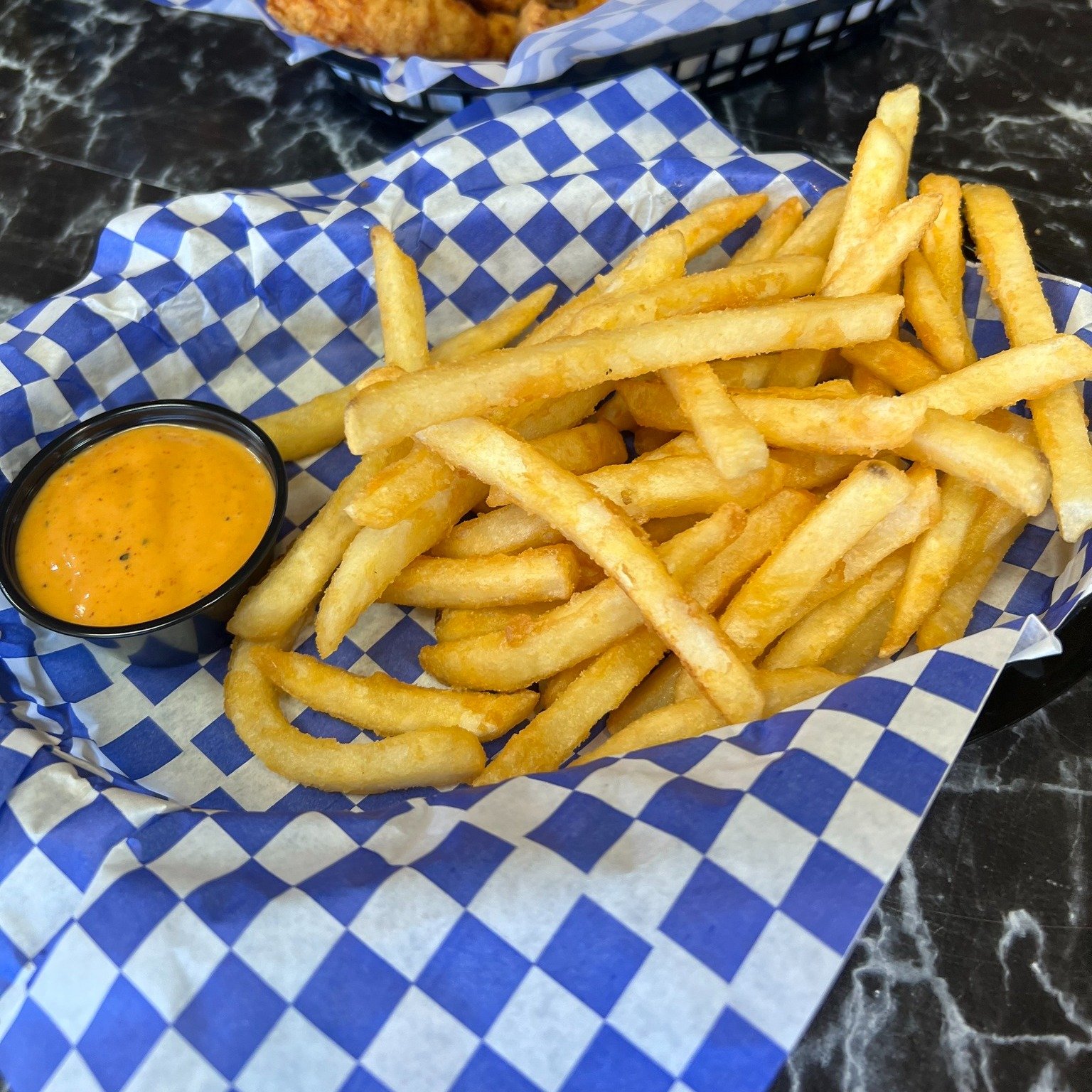 Snack, relax, repeat! 🍟🏞 Savor the crunch of our delicious French fries while you unwind on our scenic patio. It&rsquo;s snack time perfected!

#theklubelko #rubyviewgolfclub #elkonv