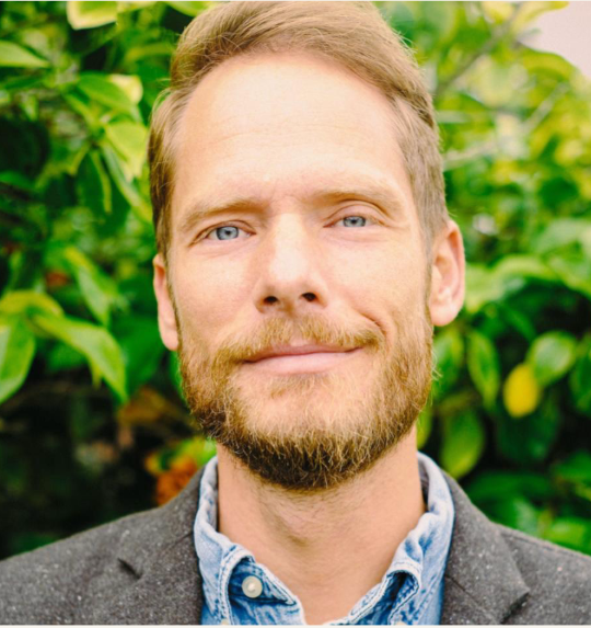male professor with red hair.  ADHD, Autism, dyslexia, neuropsychological assessment, psychotherapy
