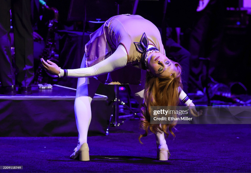 Sarah Childs performing at the M3GAN event — professional contortionist & flexibility coach