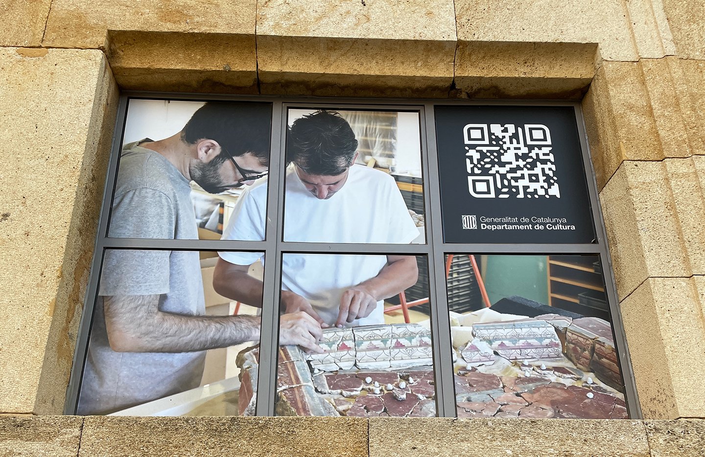 A museum window showing restoration work