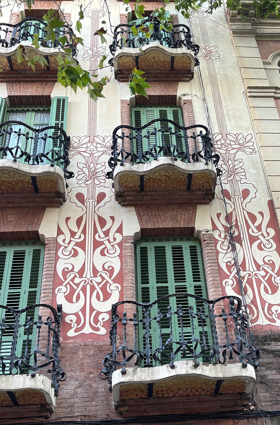   The undersides of the balconies are decorated with mosaic! the lovely decoration on the walls is called sgraffito.  