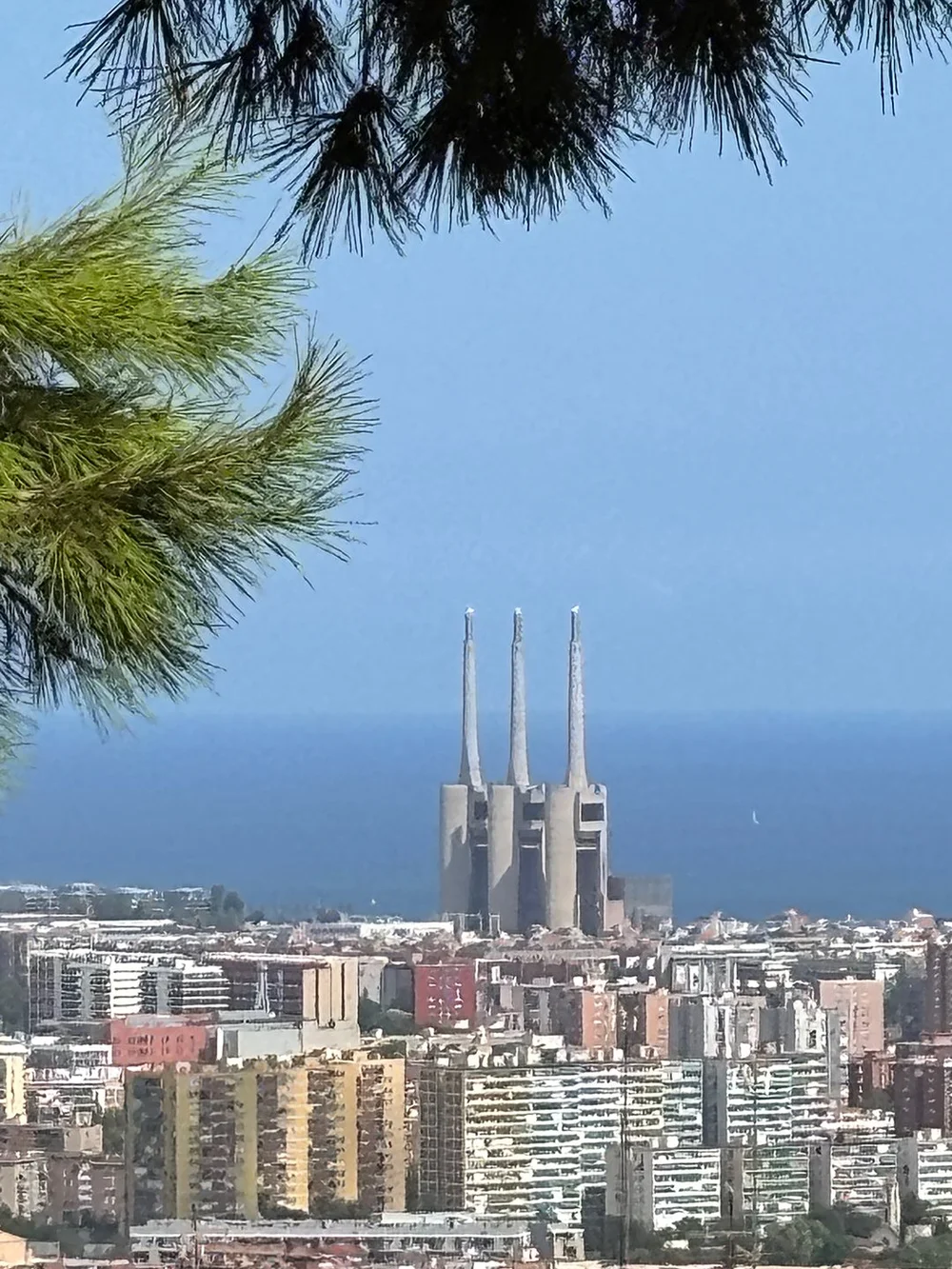   View of the defunct power plant “Tres Chimeneas” and the sea.  