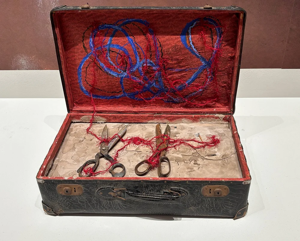 The exhibition contained many of the artist’s collection of vintage suitcases.