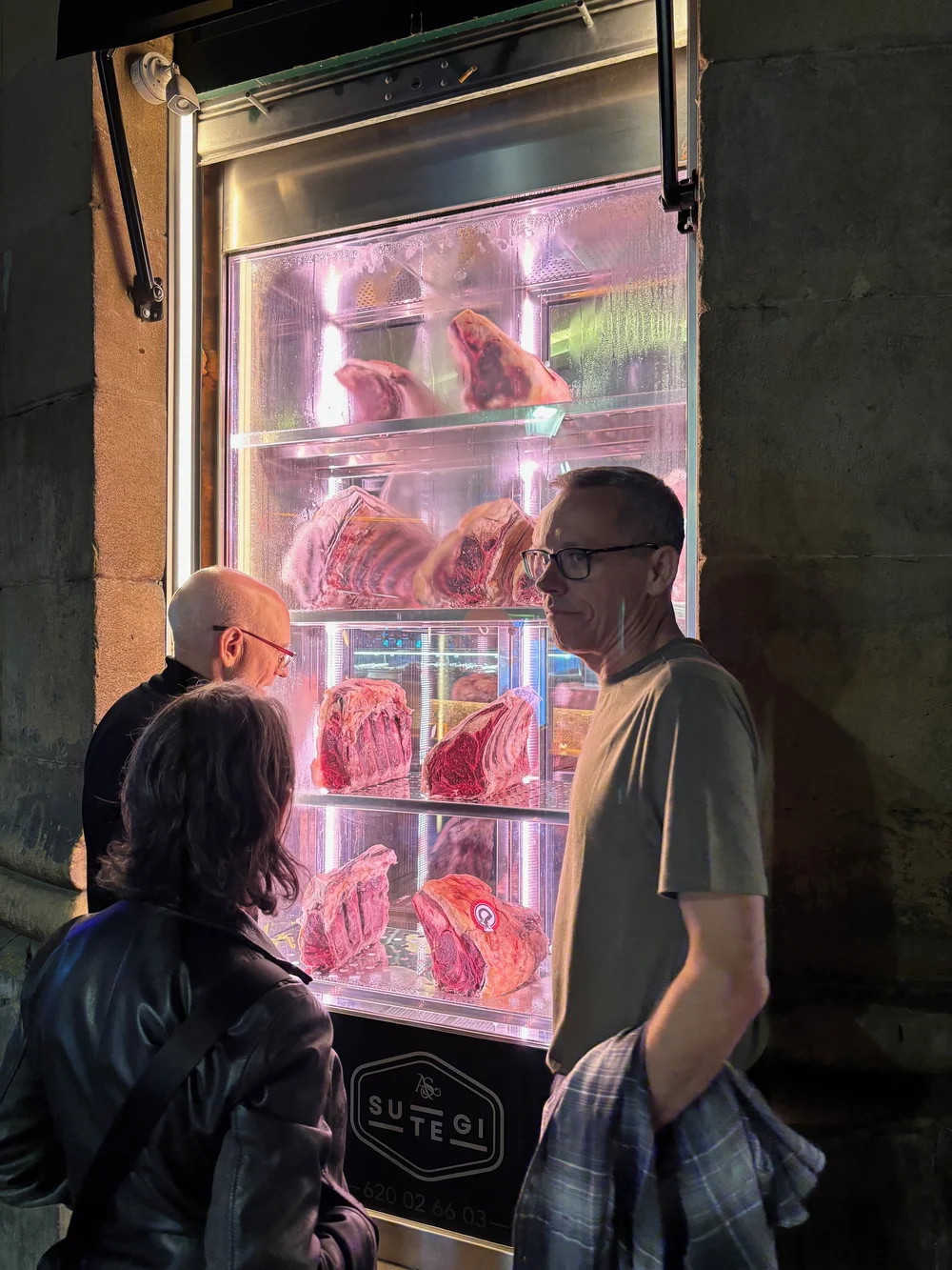 Checking out the beef ageing chamber of a restaurant specializing in big steaks.