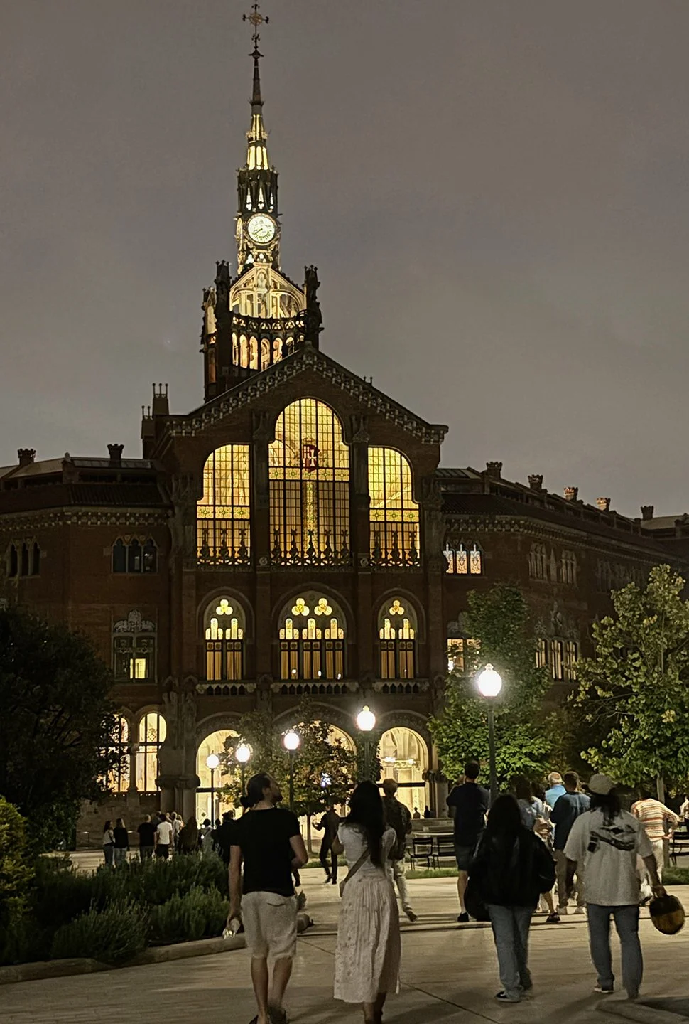Main building, beautifully lit stained glass windows.
