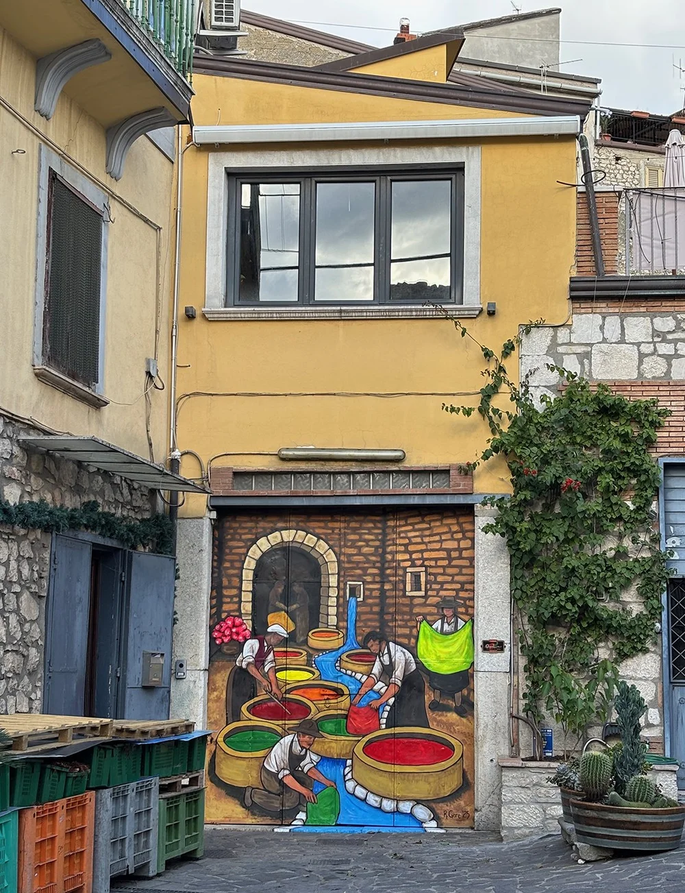 Mural depicting leather dyeing, an industry that used to be in this town.