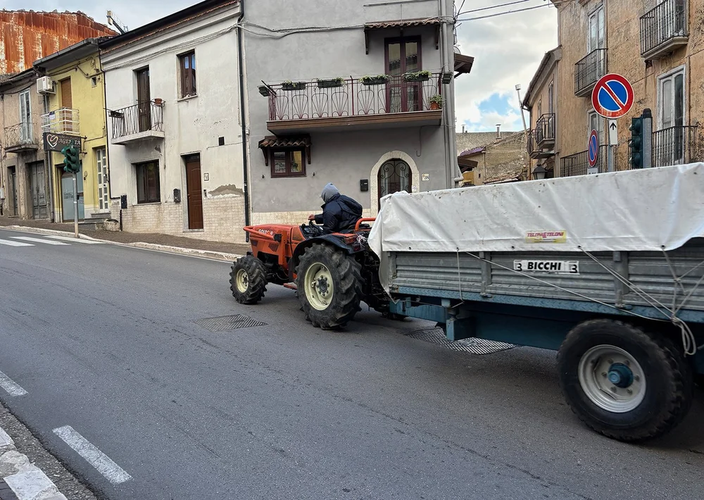 Harvest truck rumbling through the main drag.