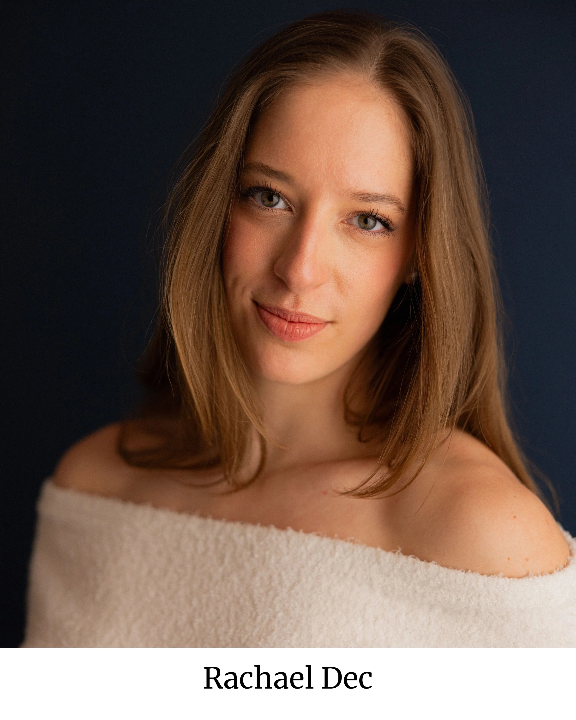Rachael Dec Headshot Blue titled.jpg