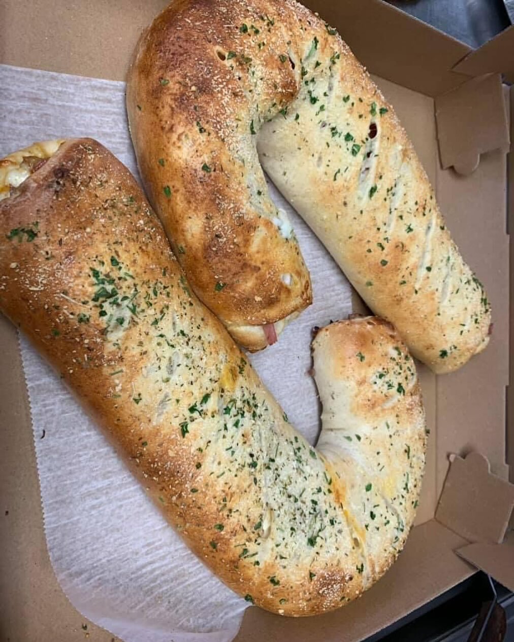 Stuffed Candy Cane bread, order your today! Mozzarella with your choice of pepperoni, spinach, broccoli and more!