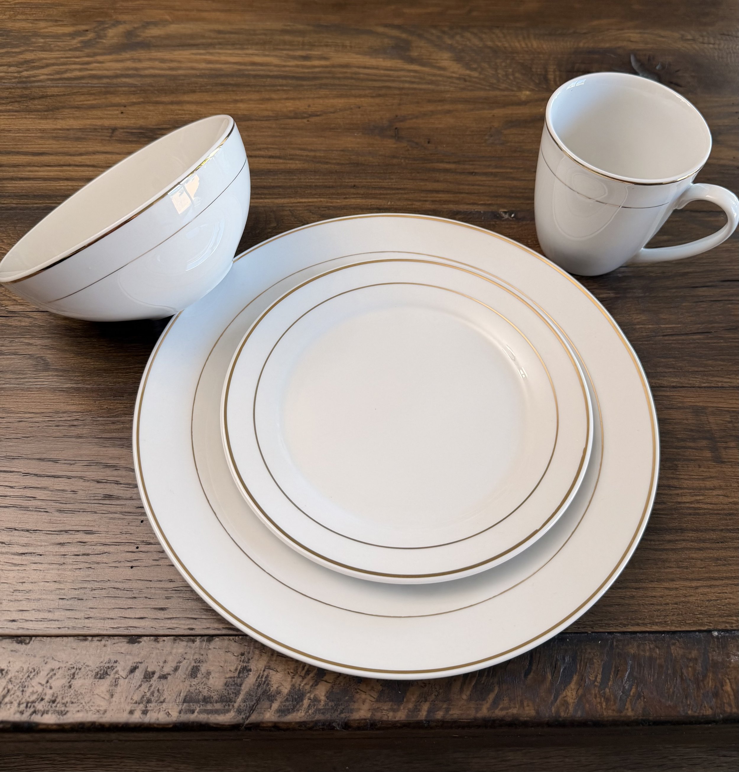 Golden Elegance Dinner, Salad Plate, Soup Bowl and Coffee Mug. Sets of 10 $8.00. 25 Rack of Mugs $25.00