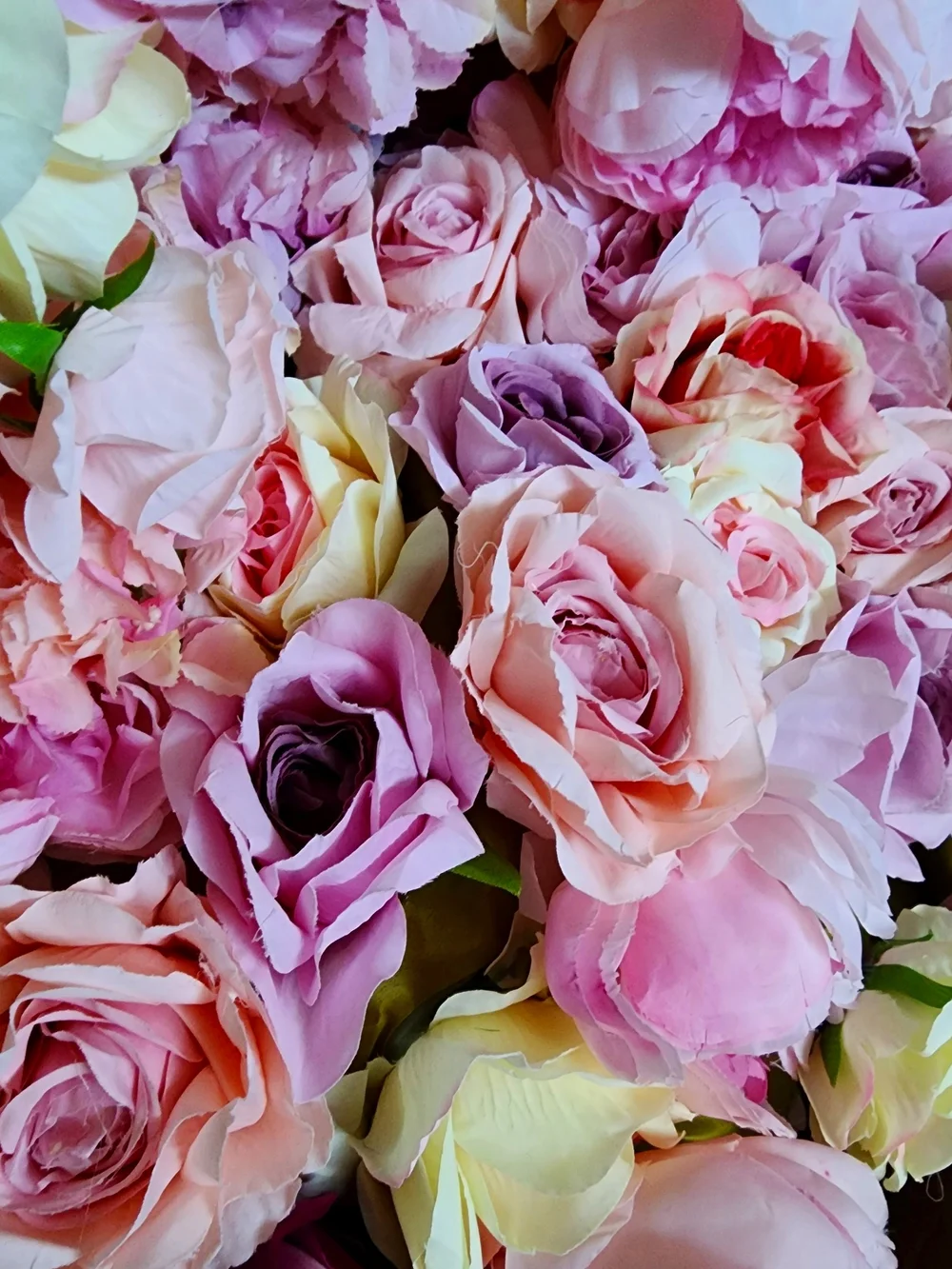 Close up of the pink and lilac flowers on the Pastel Dreams wall