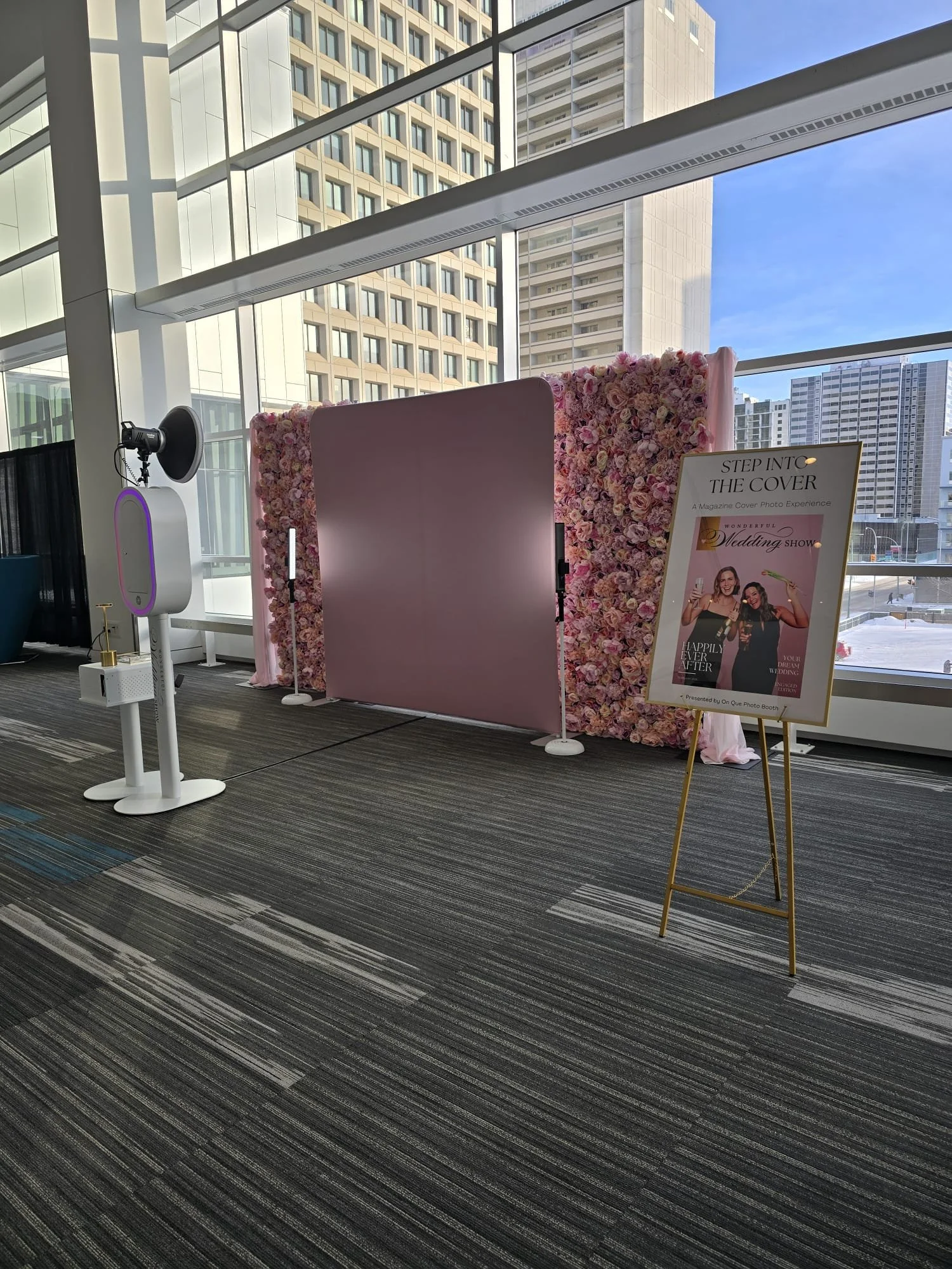 Nova at WWS with flower wall setup.jpeg