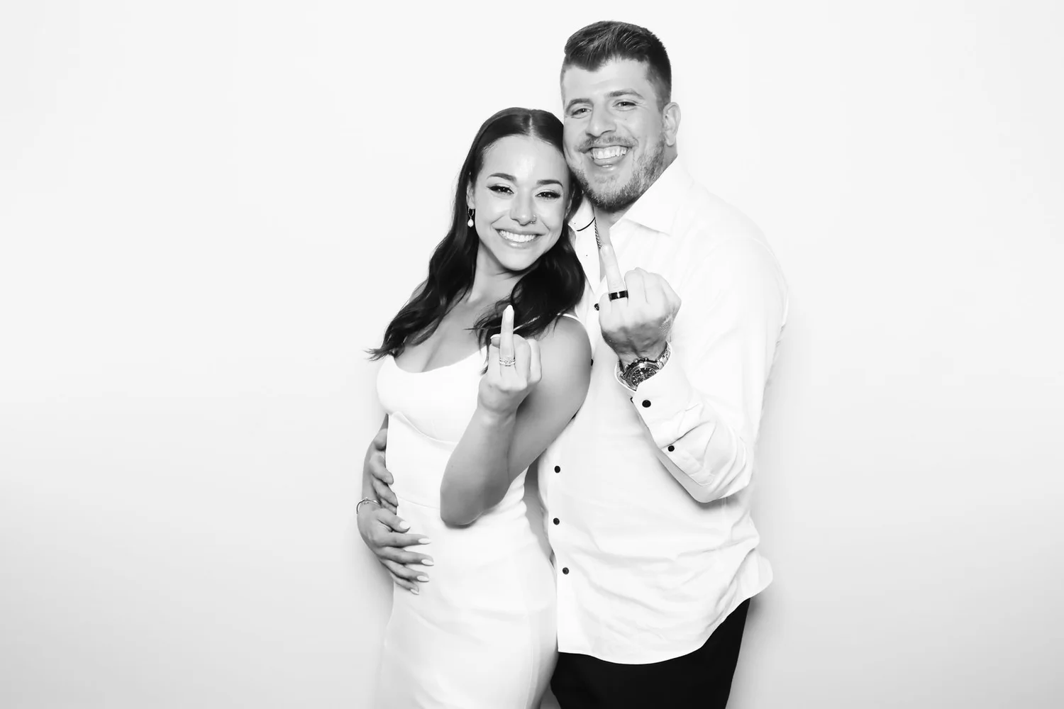 A black and white glam portrait of a couple in a Winnipeg studio setup
