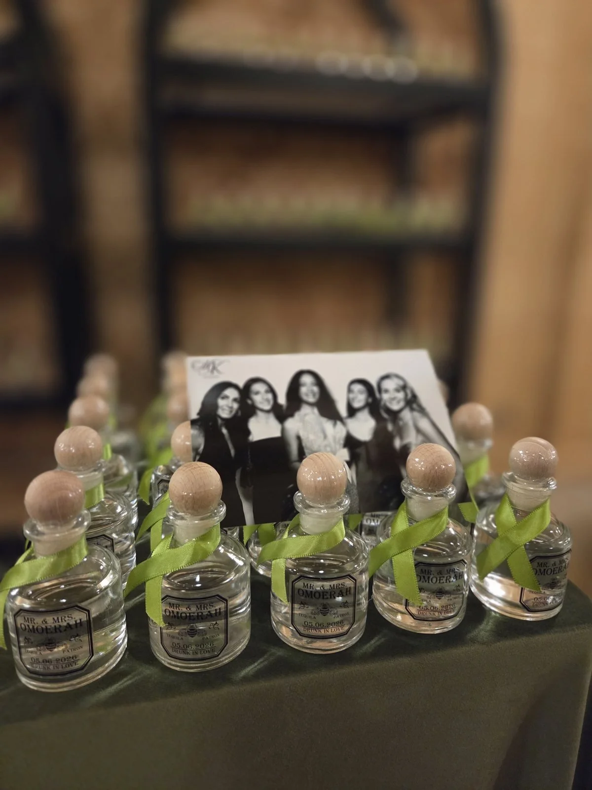 A black and white glam print standing among the wedding favours at a Winnipeg reception