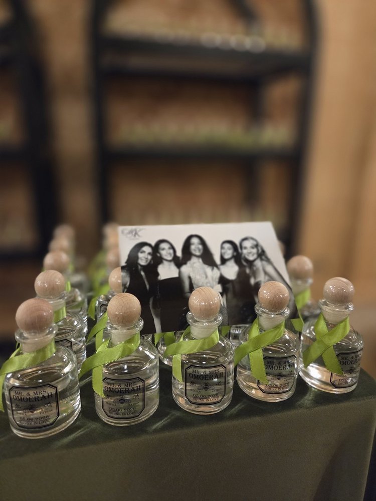 A black and white glam print standing among the wedding favours at a Winnipeg reception