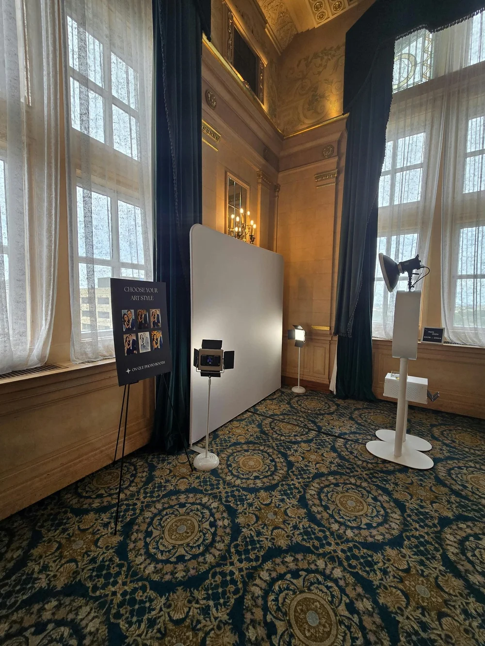 The AI photo booth set up against a white backdrop at the Fort Garry Hotel