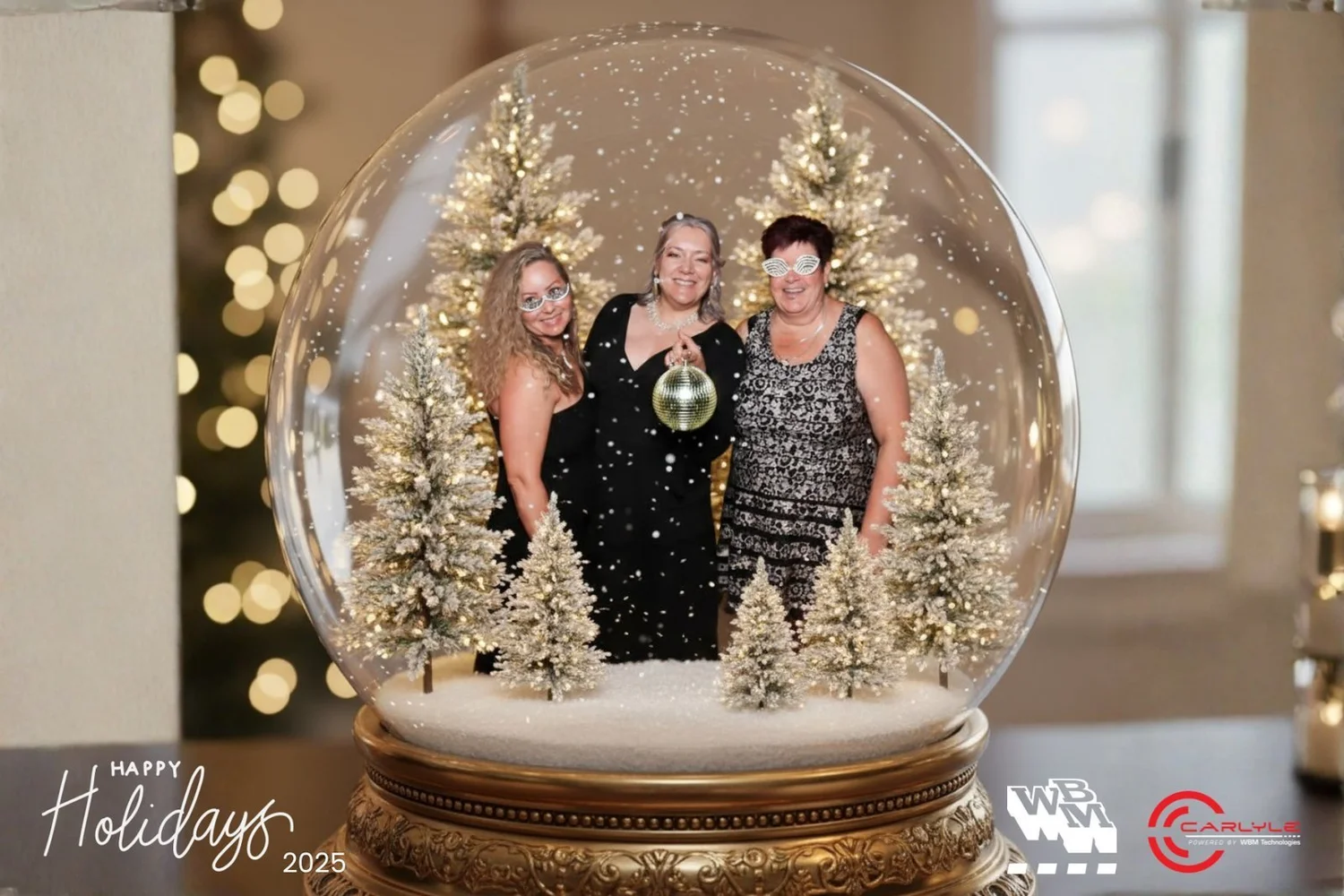 Guests inside a snow globe holiday portrait from the On Que photo booth in Winnipeg