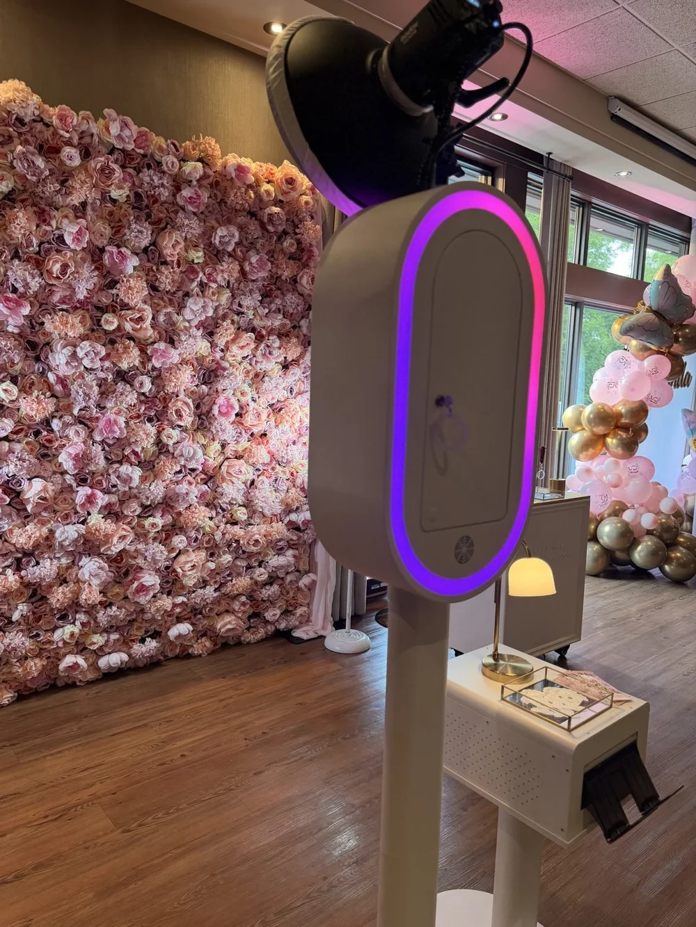A pastel flower wall standing on its own at a Winnipeg event, no booth in front of it