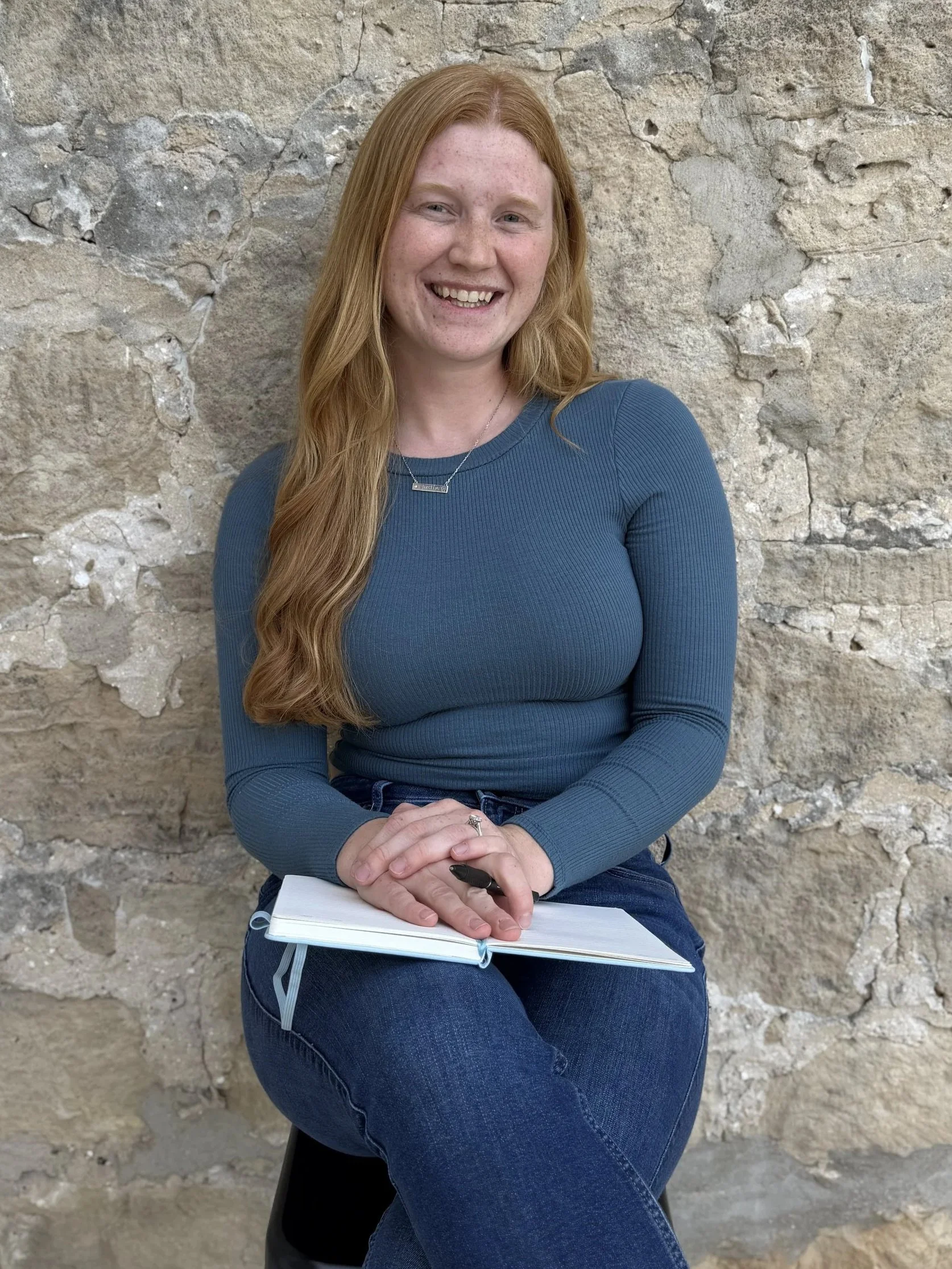 Couples therapist in MKE, Miriam Ninmann against rock backdrop