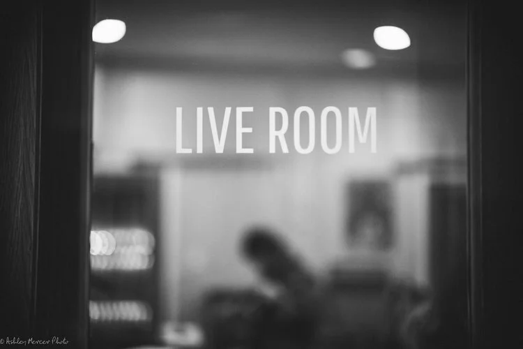 A look through Oranjudio's Live Room door into the recording studio.