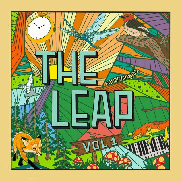 Colorful illustrated cover of "The Leap Vol. 1" featuring a clock, dragonfly, bird, lizard, fox, mushrooms, and a forest scene.