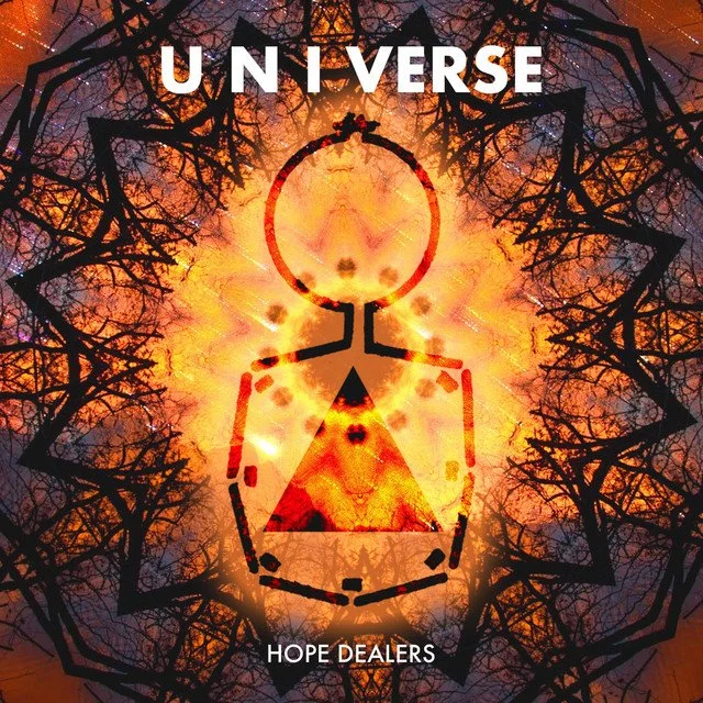 Artwork featuring a stylized human figure with a triangle on the chest, set against a fiery background with black tree branches forming a circular pattern. The text reads 'U N IVERSE' at the top and 'HOPE DEALERS' at the bottom.