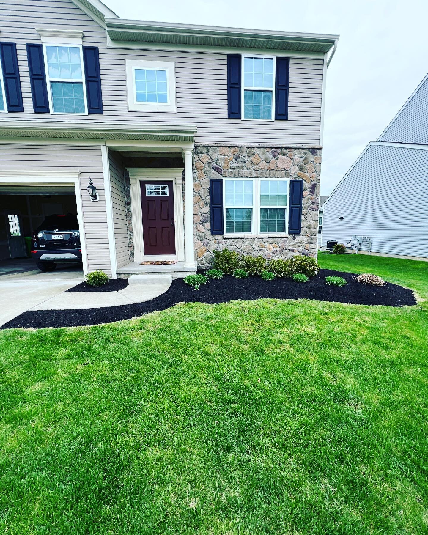 Beautiful garden bed cleanup and fresh mulch laid.