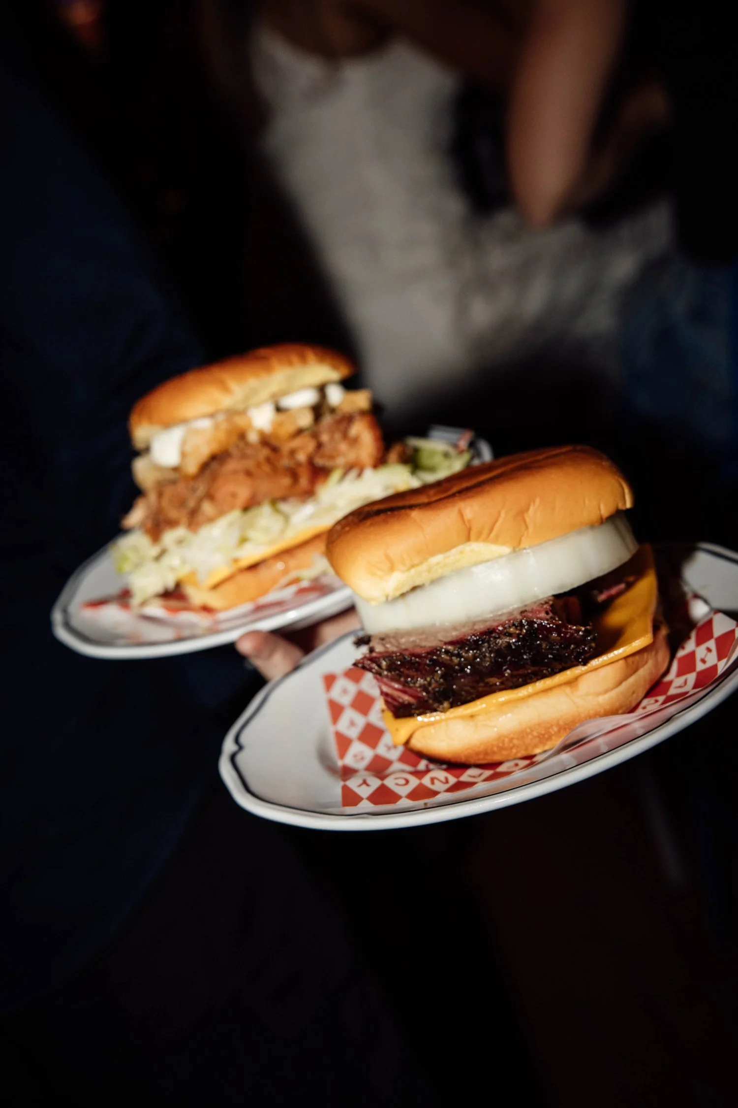 Brisket and fried chicken sandwiches served on the rooftop at Good Heavens