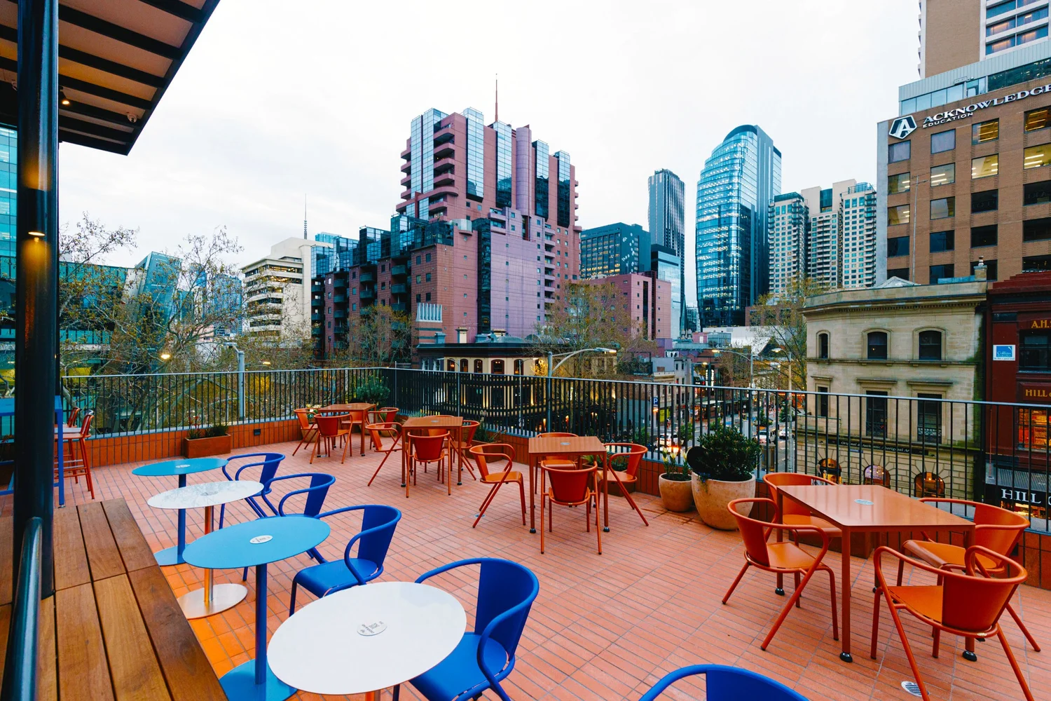 The Good Heavens rooftop terrace with the Melbourne skyline behind
