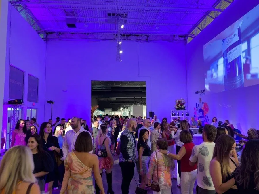 Vibrant scene at Spectrum Miami Art Fair during Art Basel Week, where artist Colleen Hoffenbacker exhibited her work.