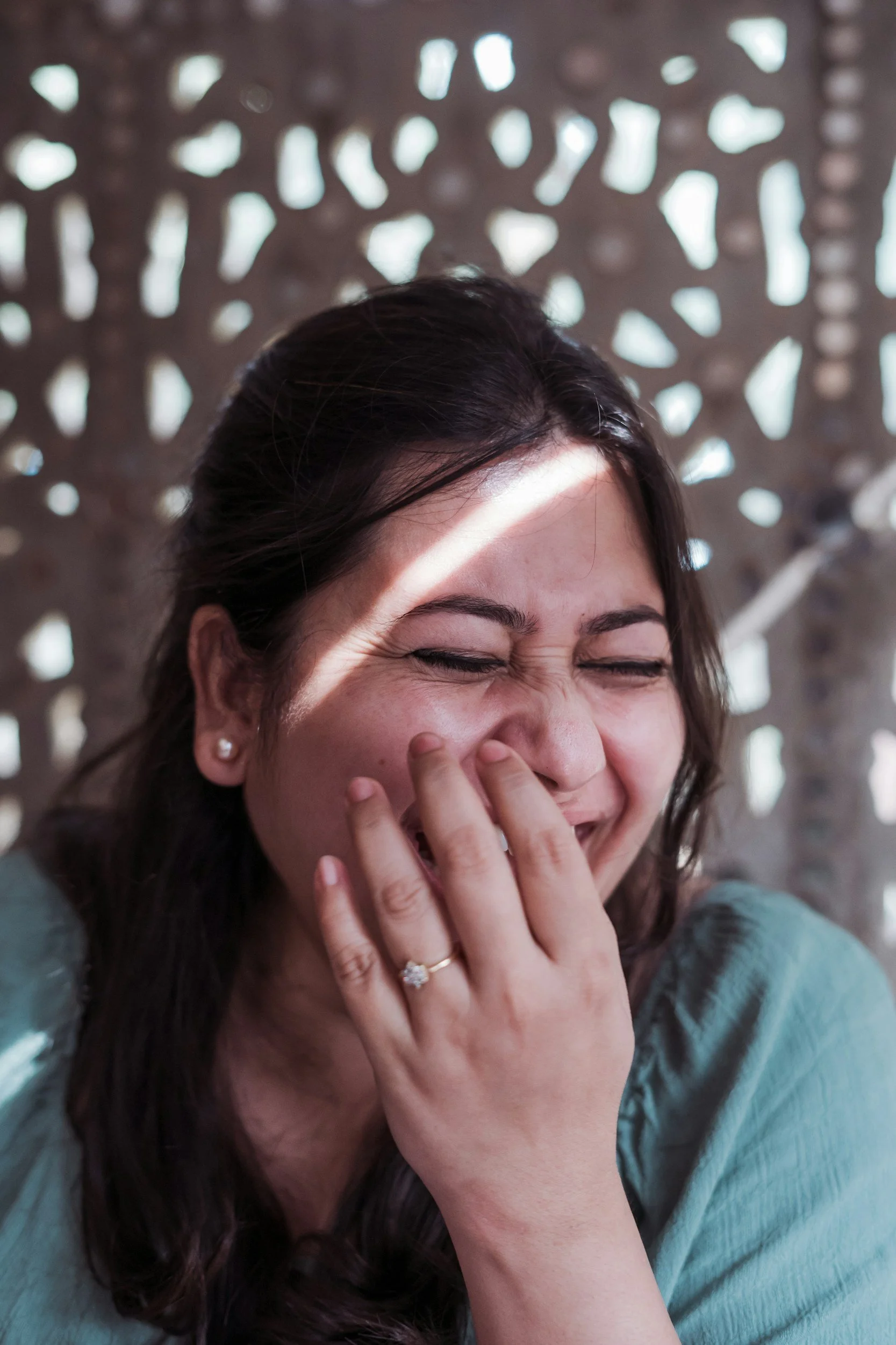 Latina woman laughing